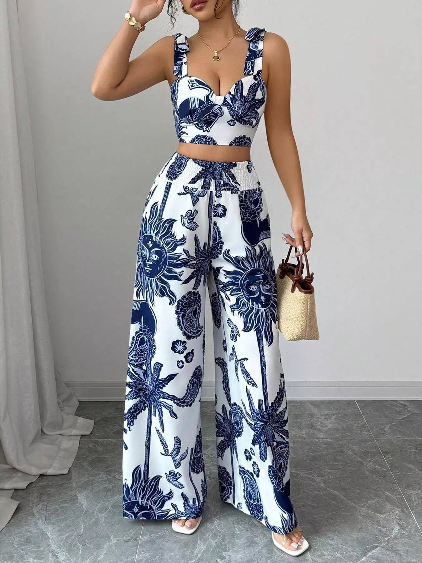 Blue and white floral crop top and wide-leg pants set, V-neck with ruffled trim