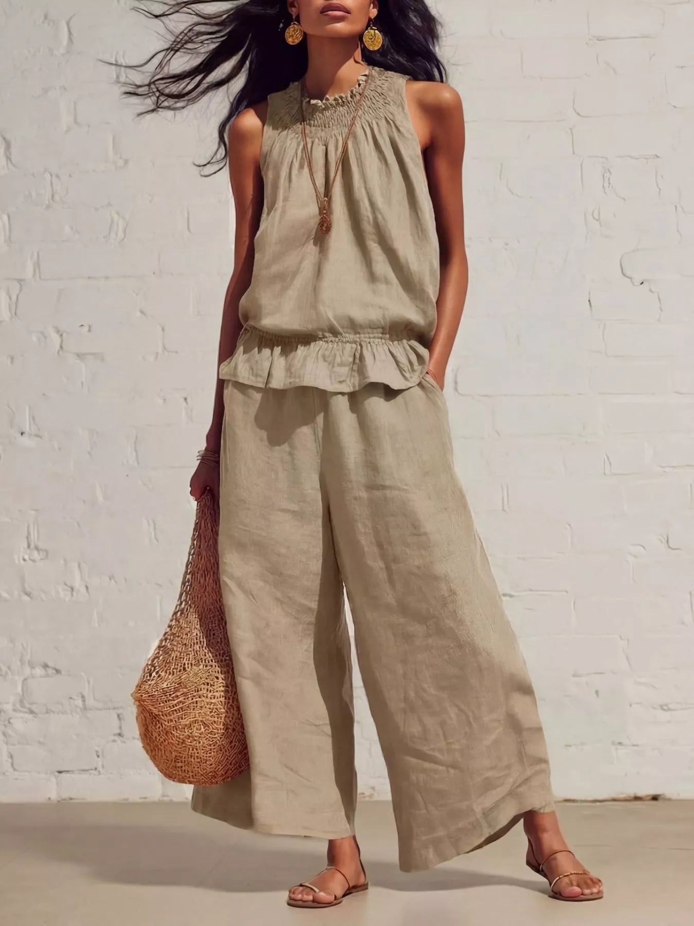 Khaki sleeveless smocked ruffled hem top and wide-leg pants set with tiered hem.