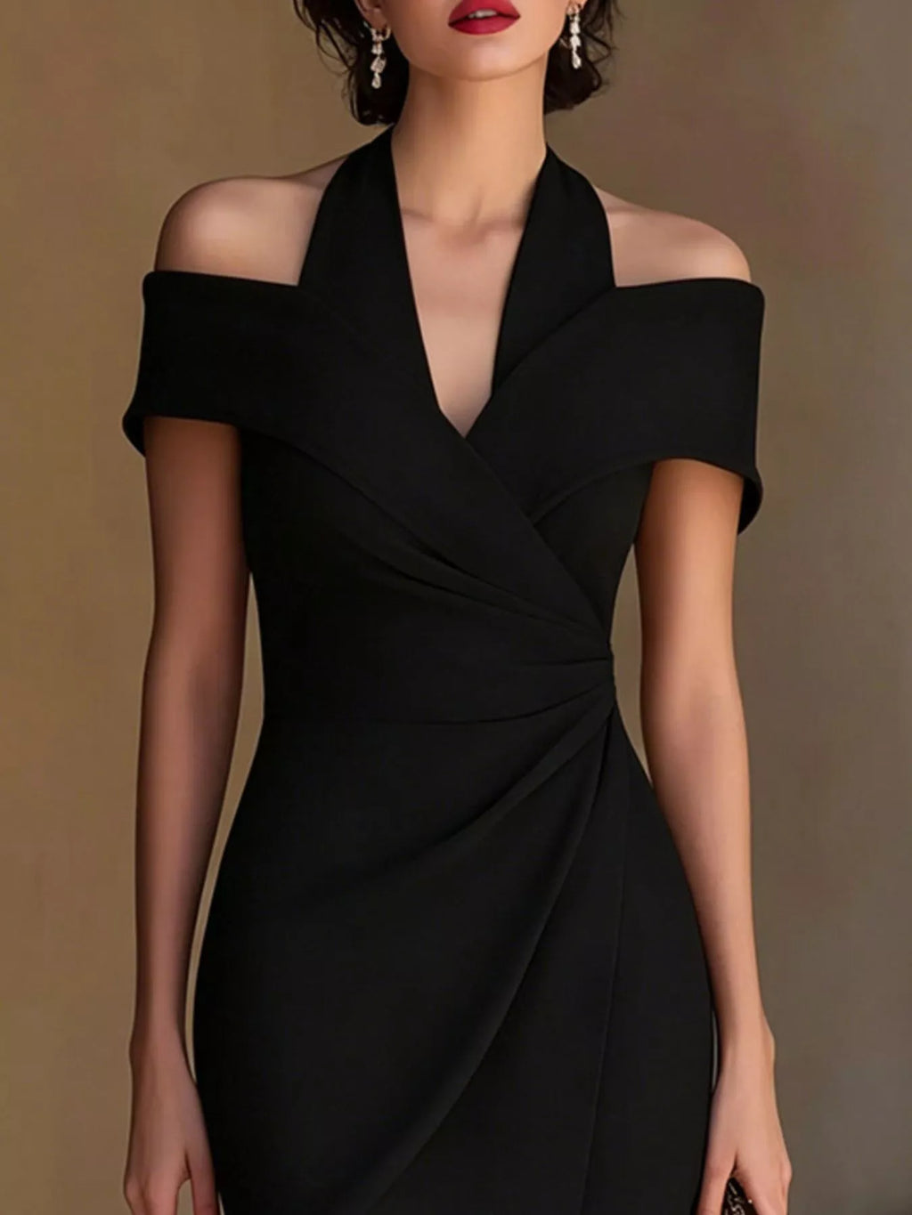 Black cold-shoulder halter neck midi dress, front with V-neck and twist wrap detail.