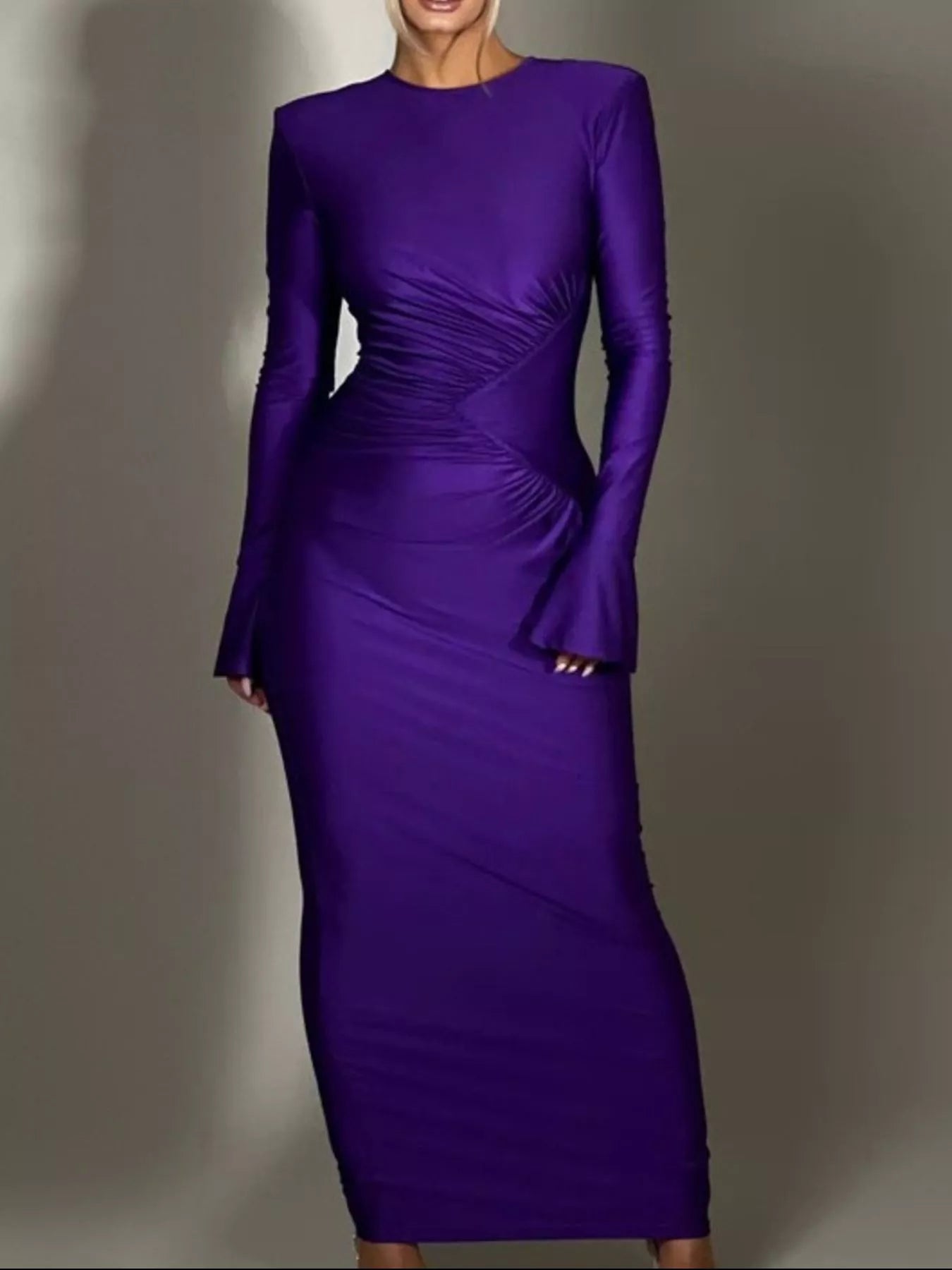 Purple ruched bodycon maxi dress with long sleeves and side-swept diagonal gathers