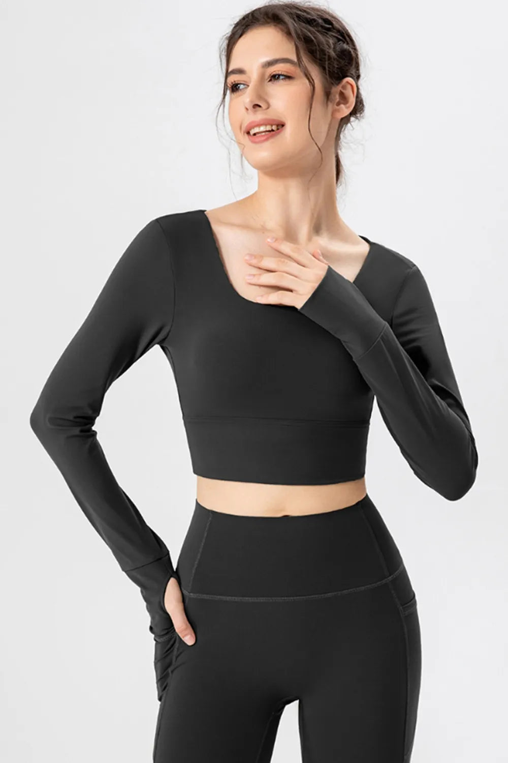 Black square-neck long-sleeve active crop top with smooth fitted waist