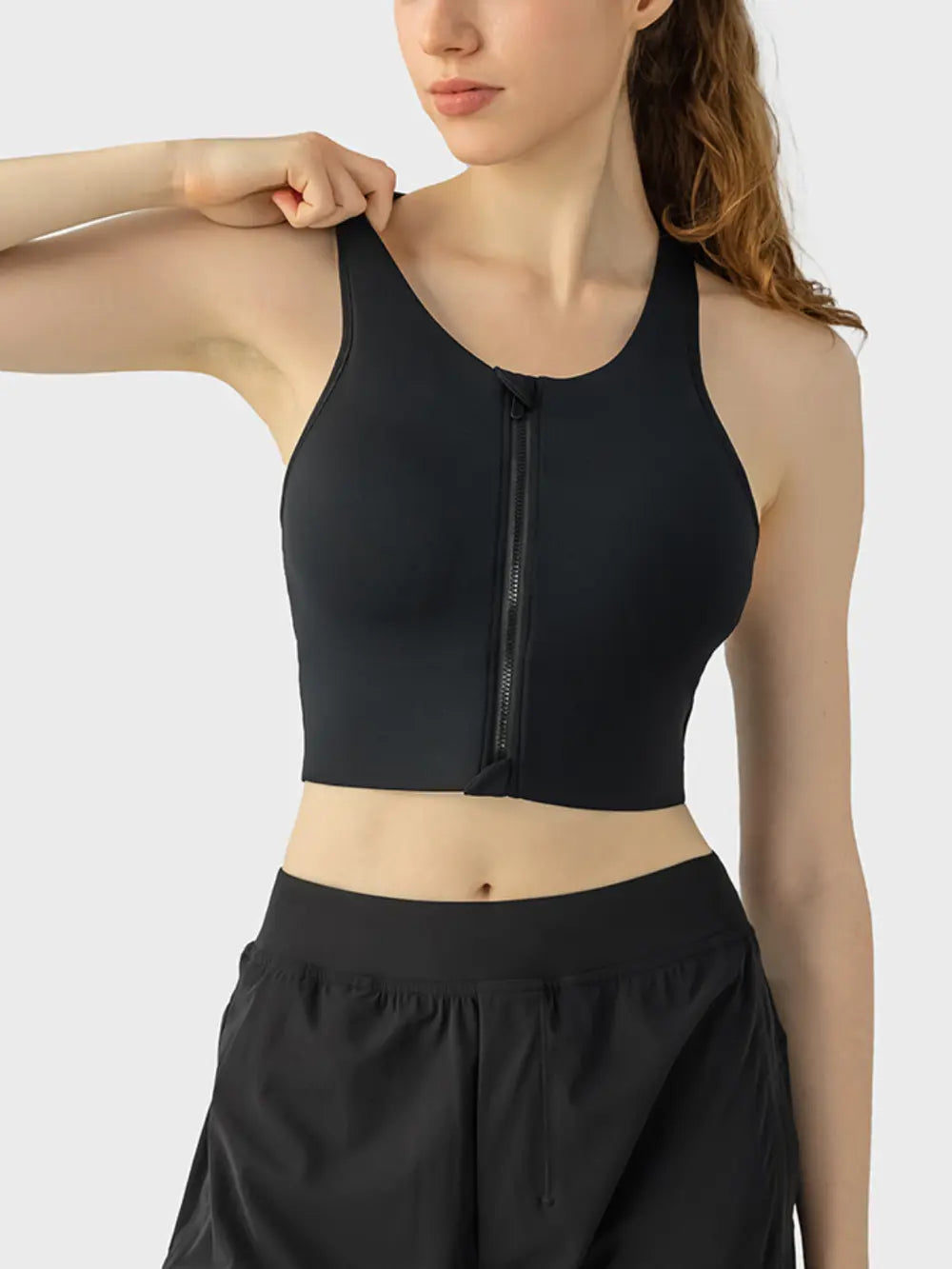 Black wide-strap sport bra with front zipper and racerback neckline