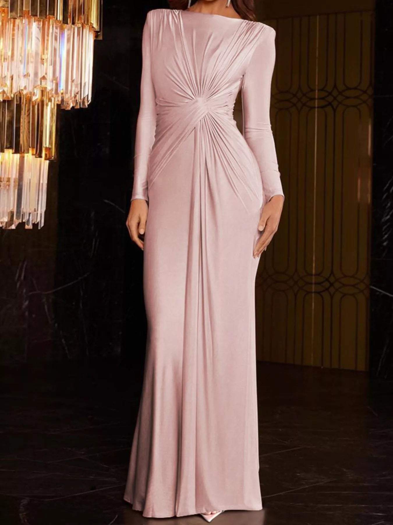 Blush pink twisted long sleeve maxi dress with ruched back knot and fitted bodice
