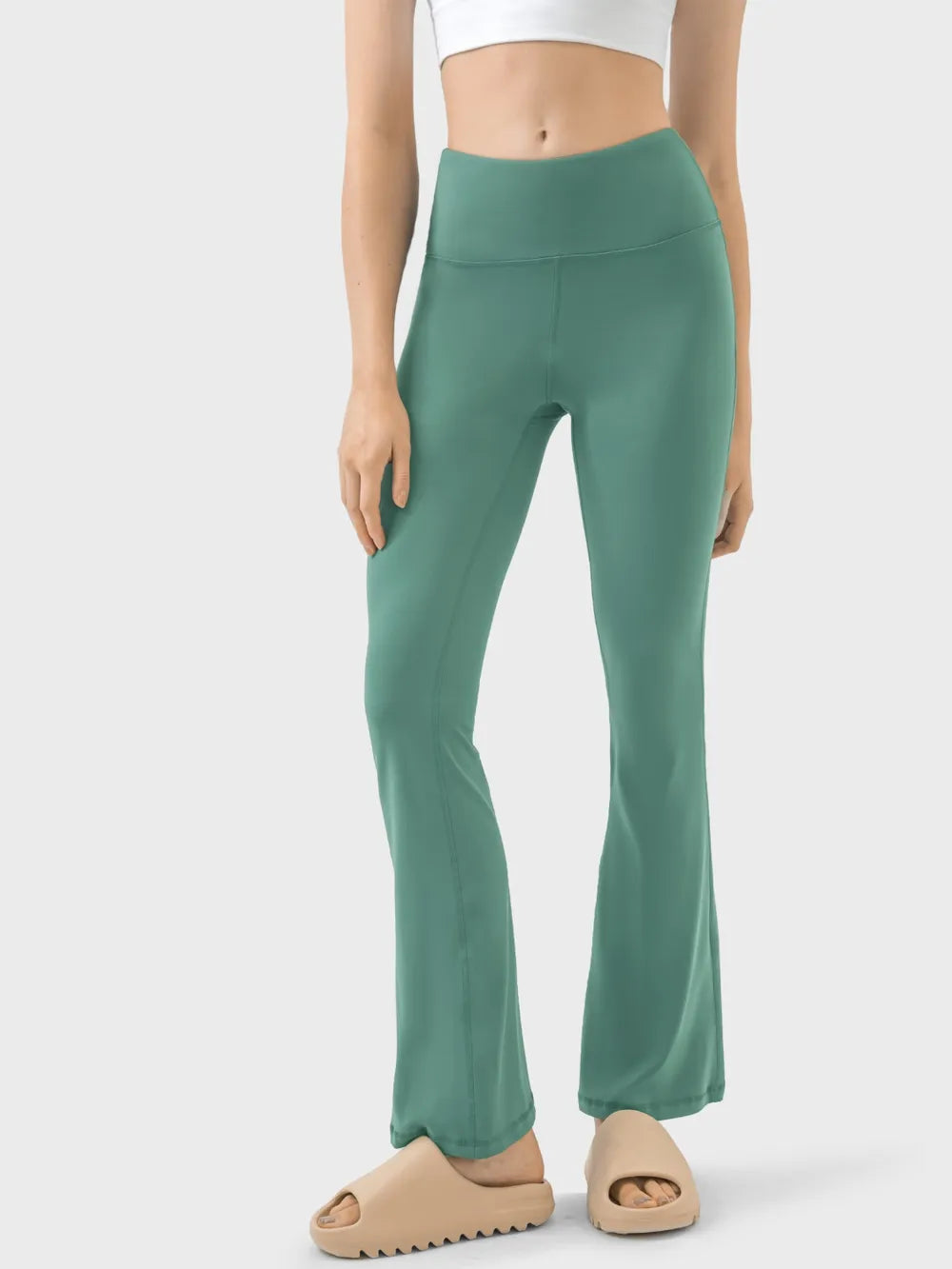 High-waist active pants, turquoise wide-leg flare