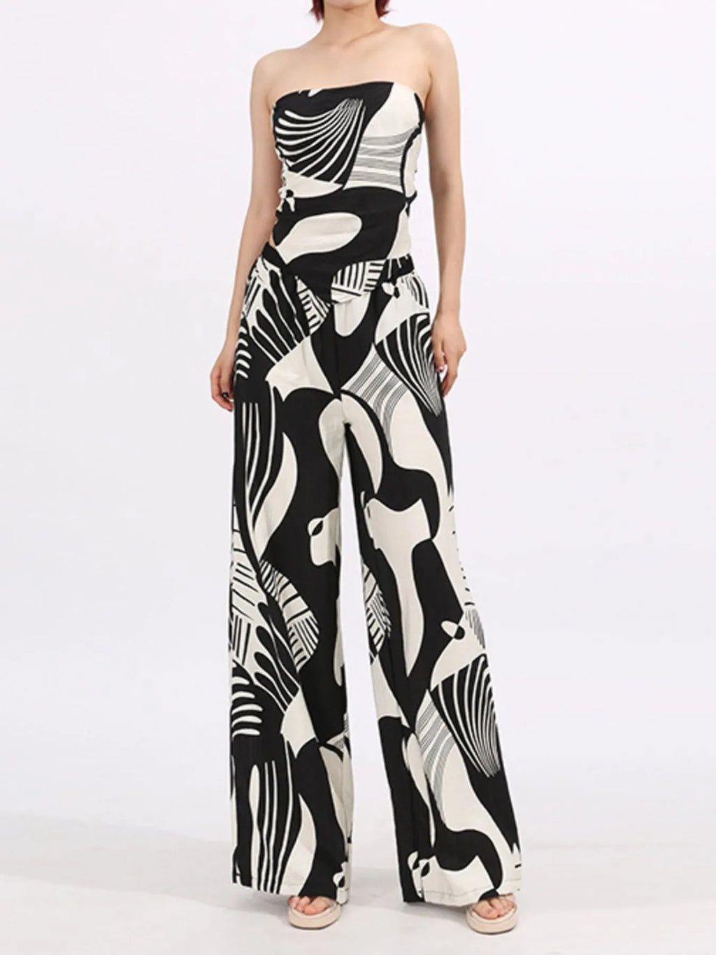 Women’s tube top and wide-leg pants set with black-and-white abstract swirl print