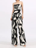 Women’s tube top and wide-leg pants set with black-and-white abstract swirl print