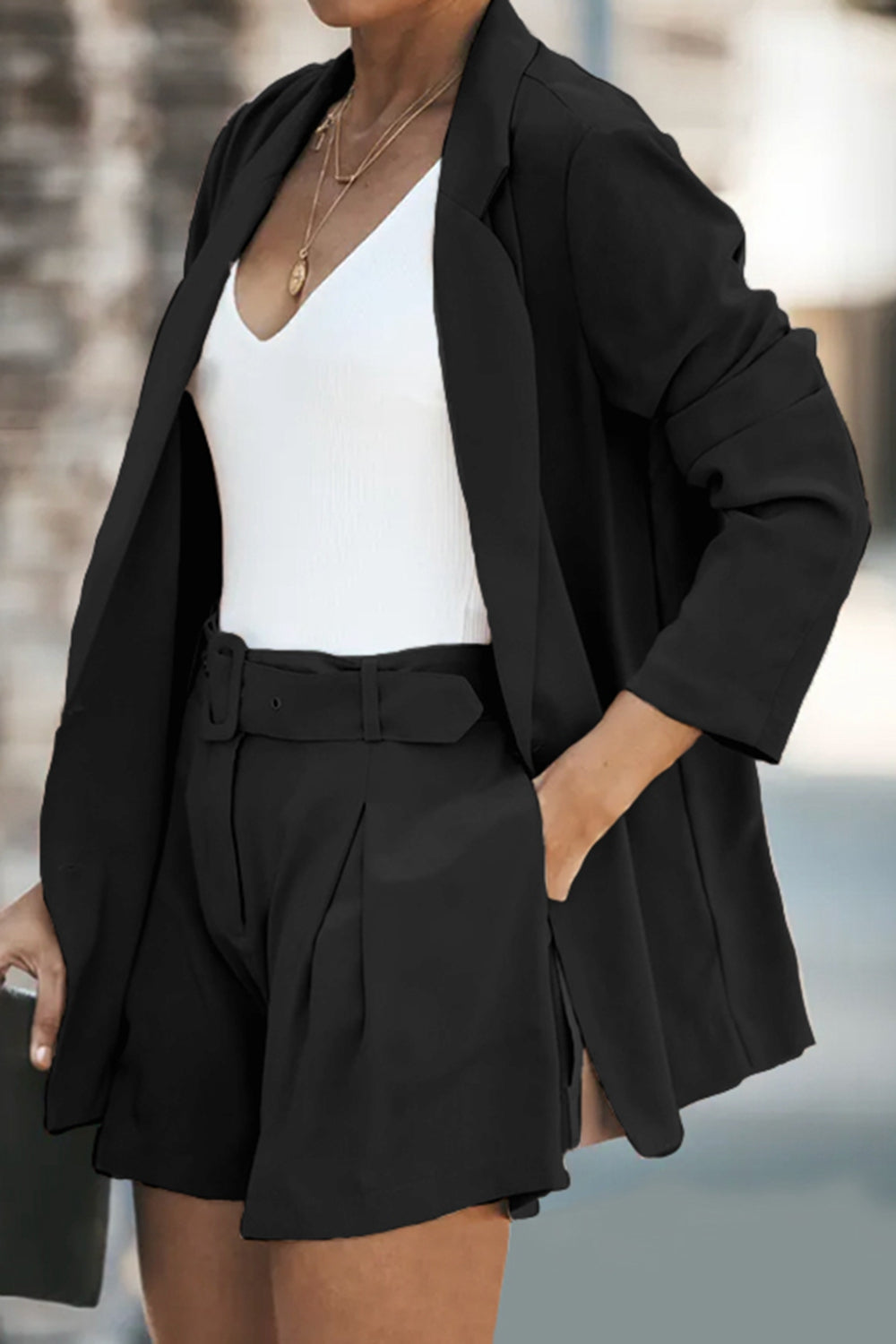Black longline blazer and shorts set with belt-buckle waist and side pockets
