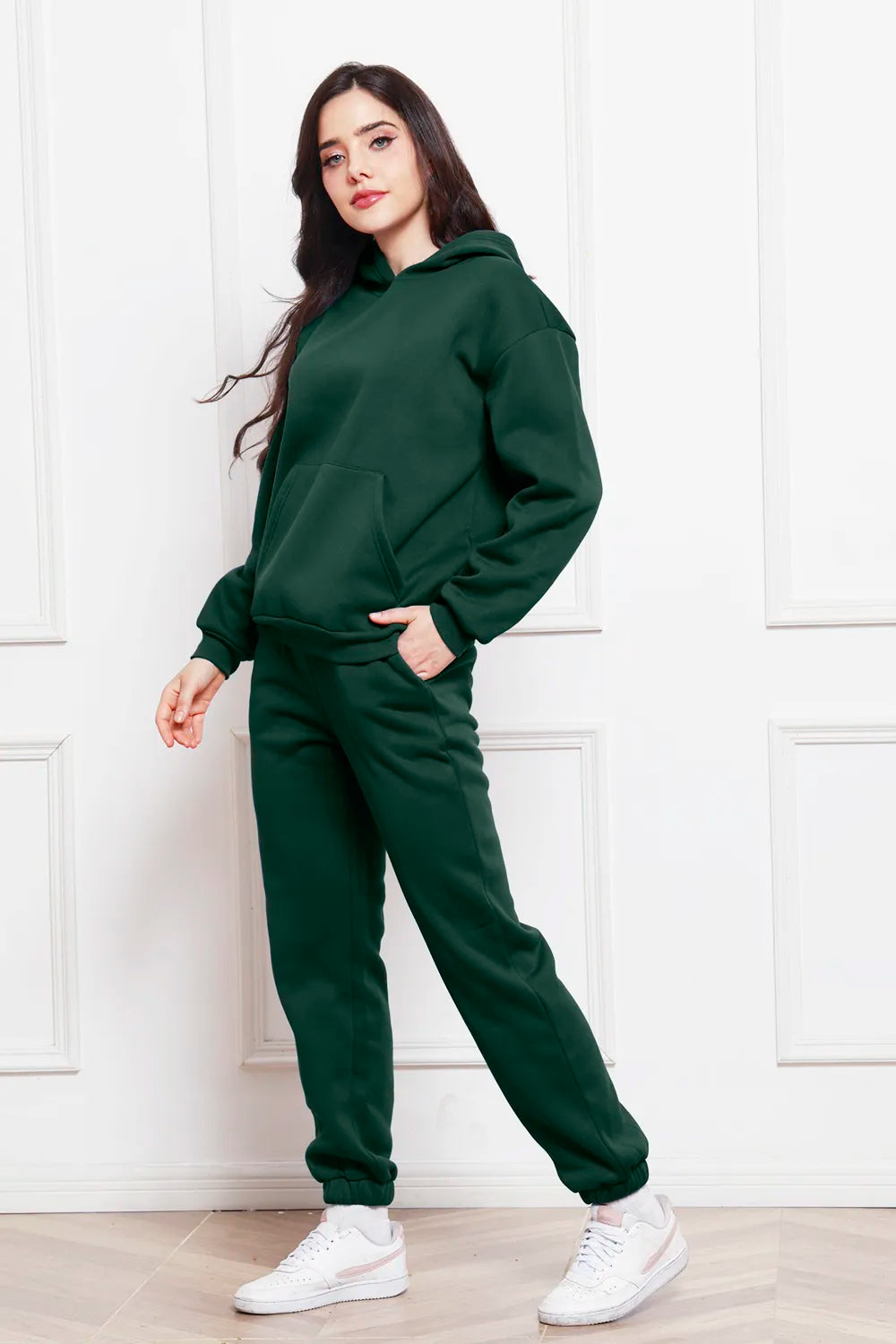 Dark green drop-shoulder long-sleeve hoodie and jogger pants set, side view