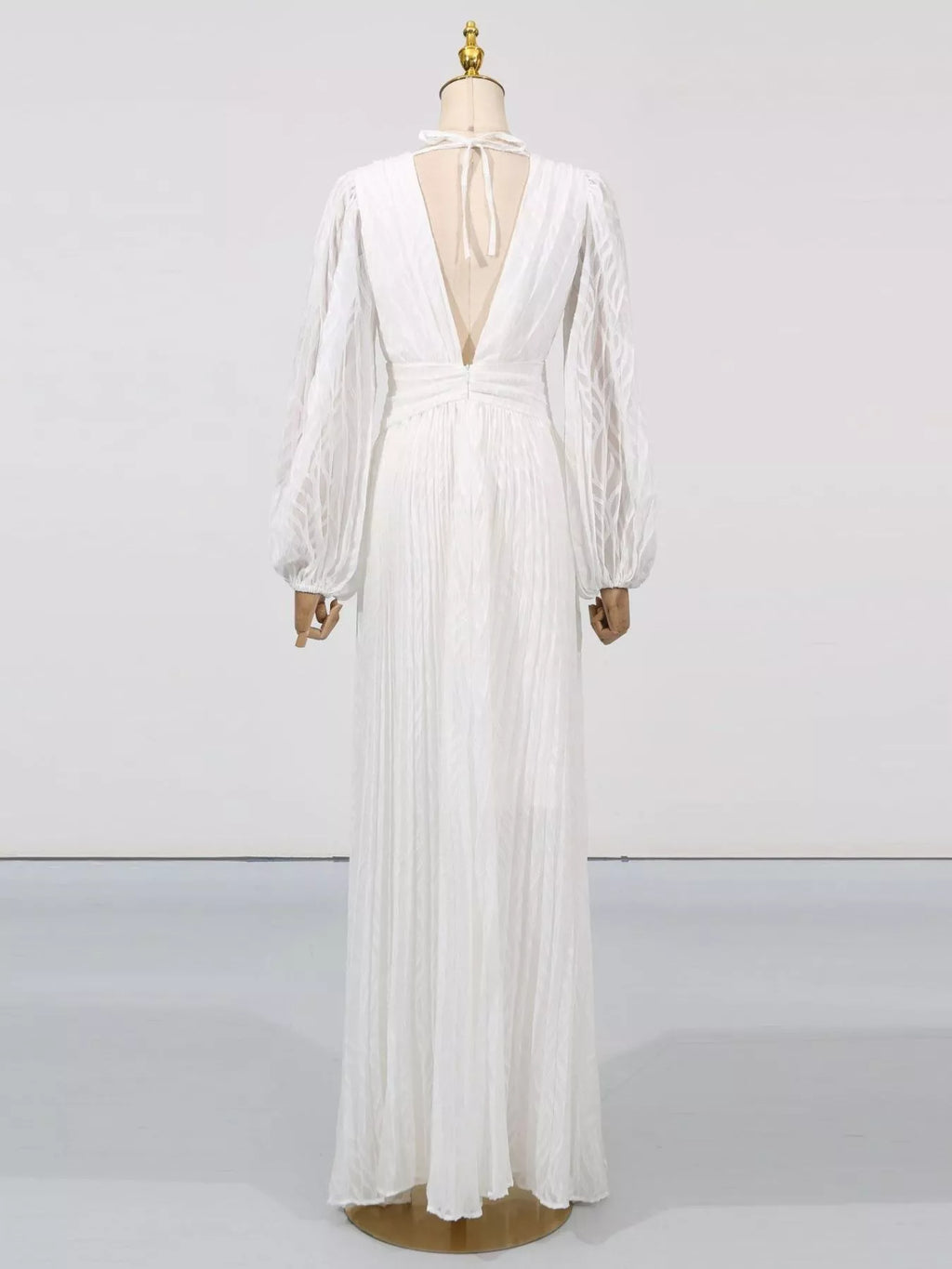 White v-neck maxi dress with open-back V and long sleeves