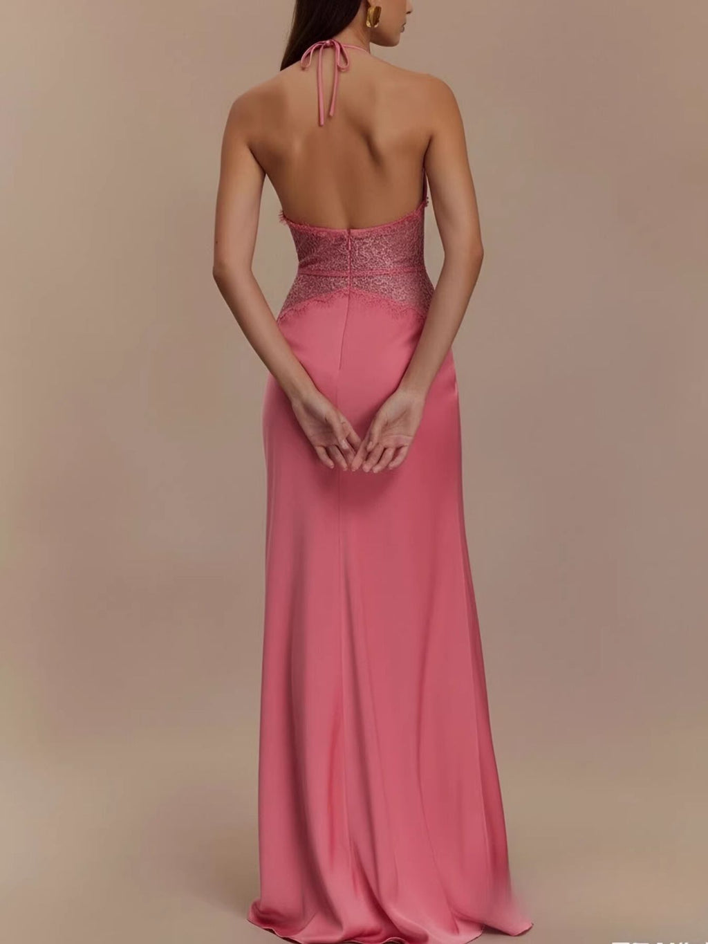 Back view fuchsia halter neck lace-trimmed maxi dress with tied straps