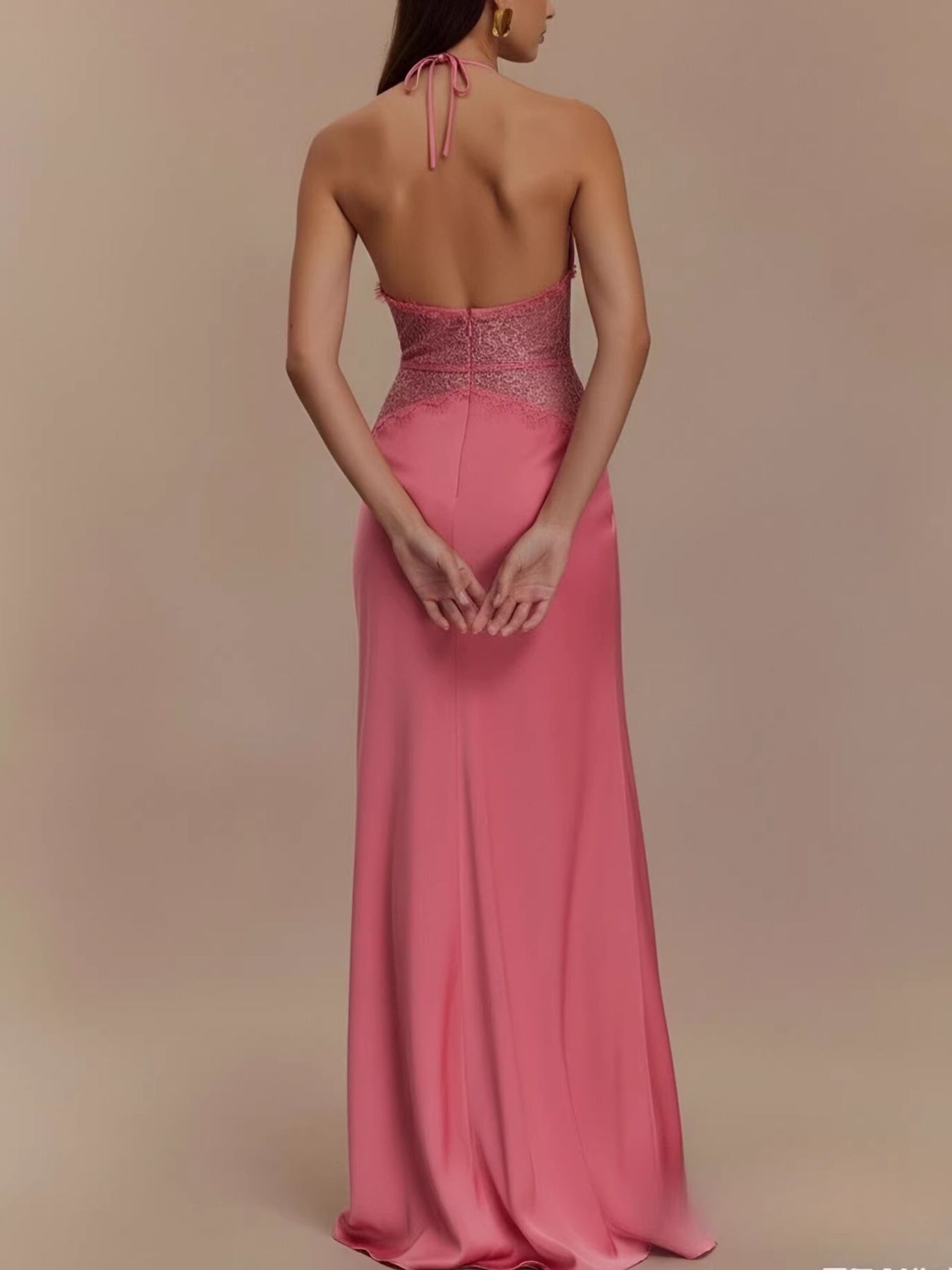 Back view fuchsia halter neck lace-trimmed maxi dress with tied straps