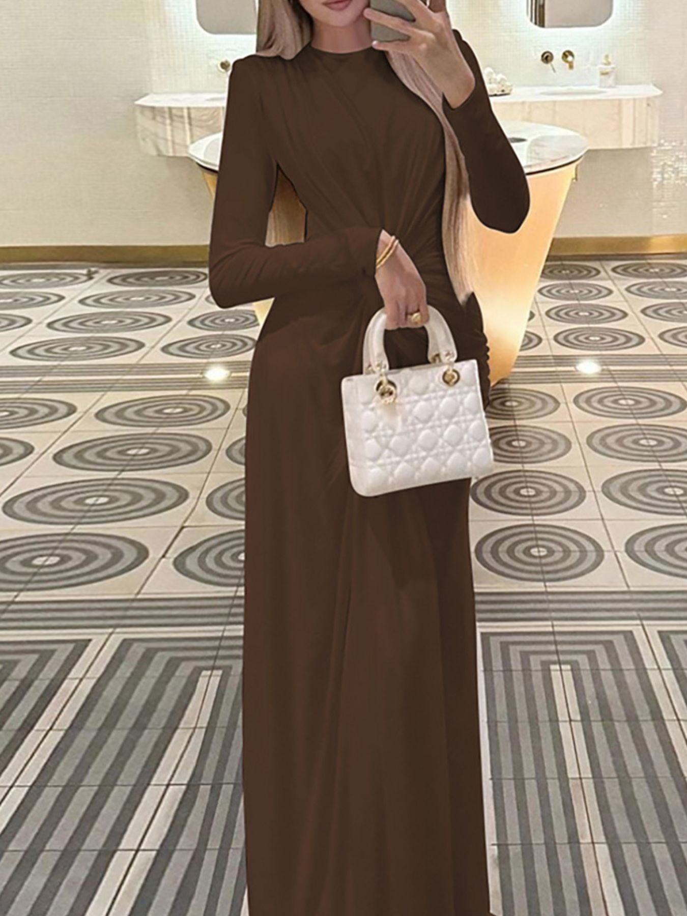 Brown long-sleeve maxi dress with ruched knot front and draped gathered waist