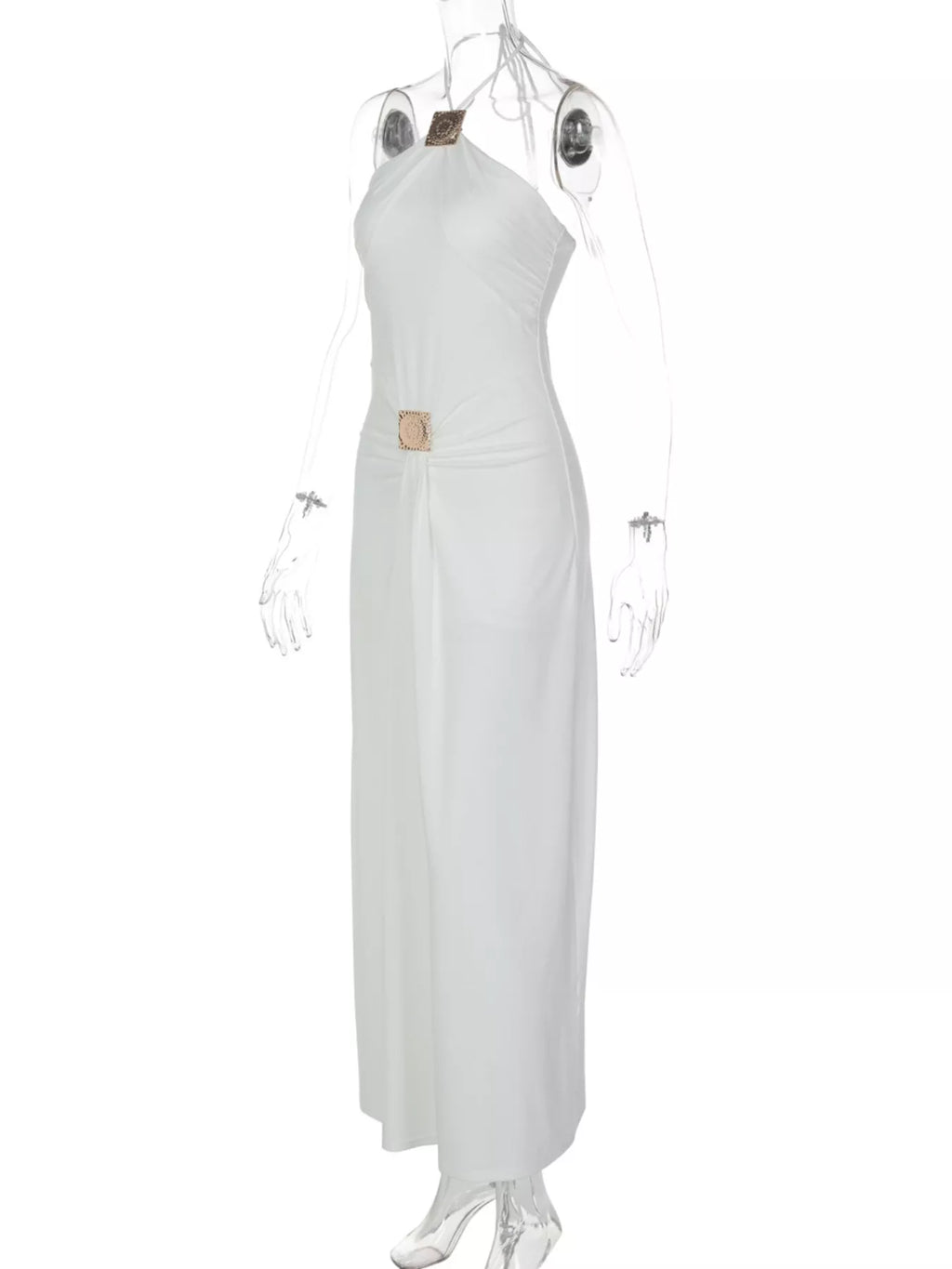 White backless halter maxi dress on hanger showing open back and ruched midsection.