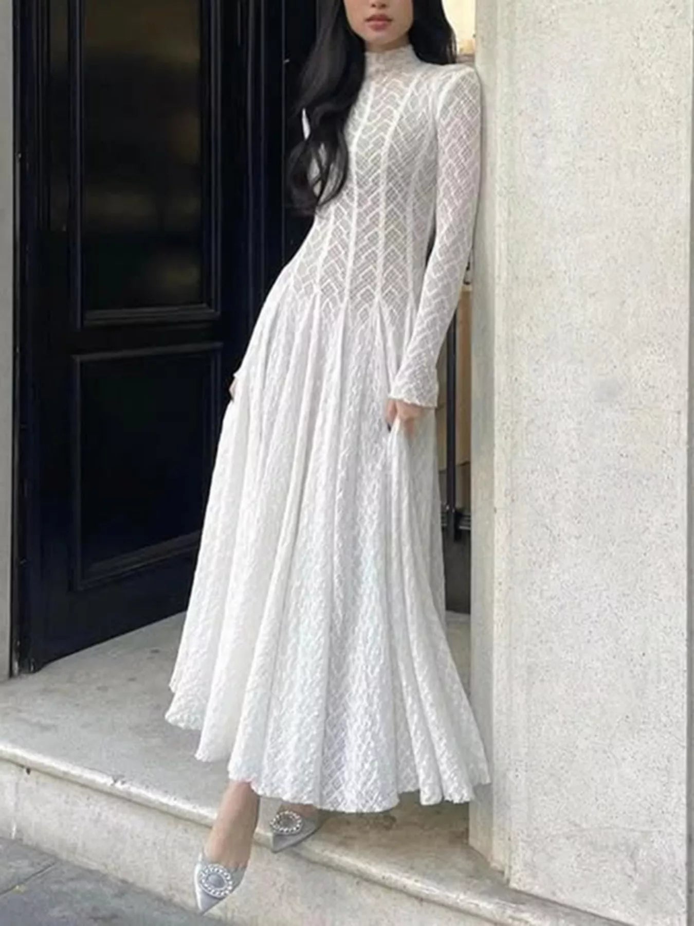 White lace long-sleeve maxi dress with mock neck and flared skirt