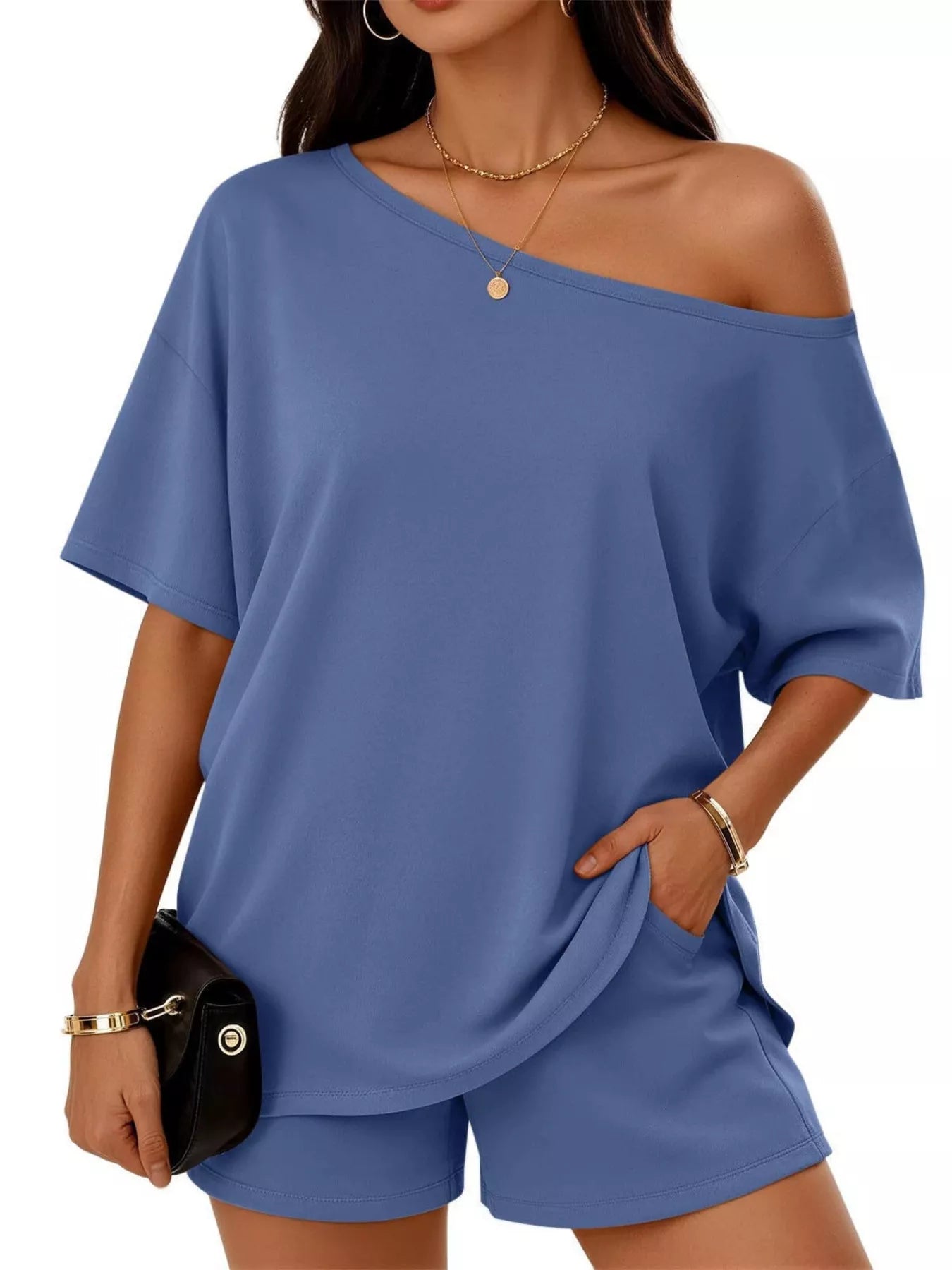 Plus size one-shoulder blue top and shorts set with diagonal neckline and draped front