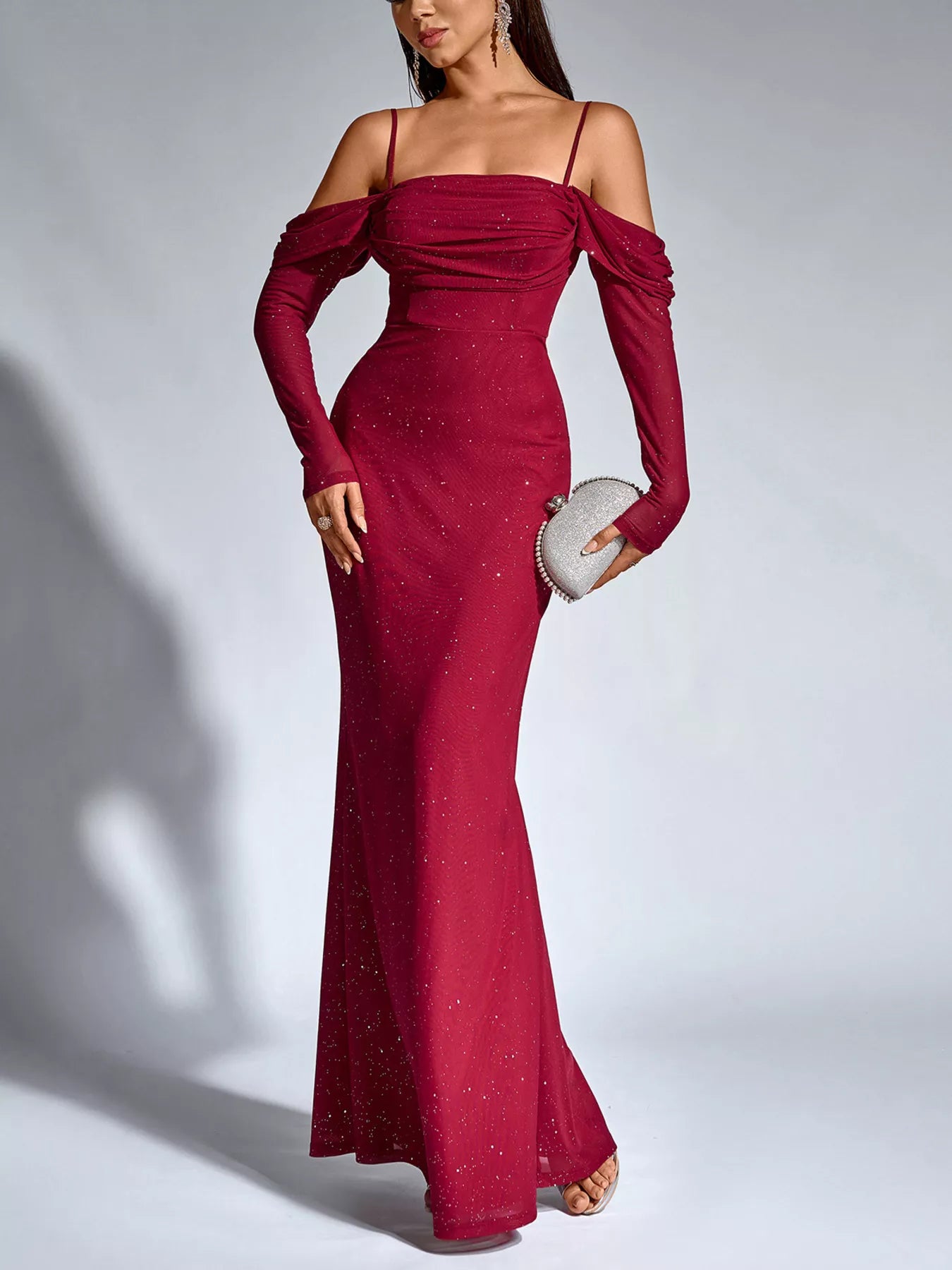Wine red glitter mermaid maxi dress with ruched bodice, long puffed sleeves, and fitted skirt