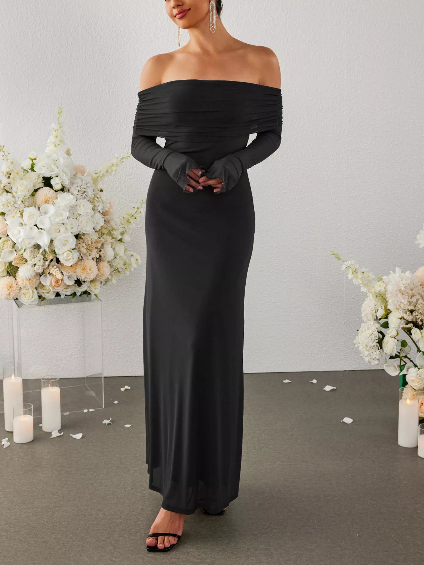 Black off-shoulder ruched maxi dress with long sleeves, front view