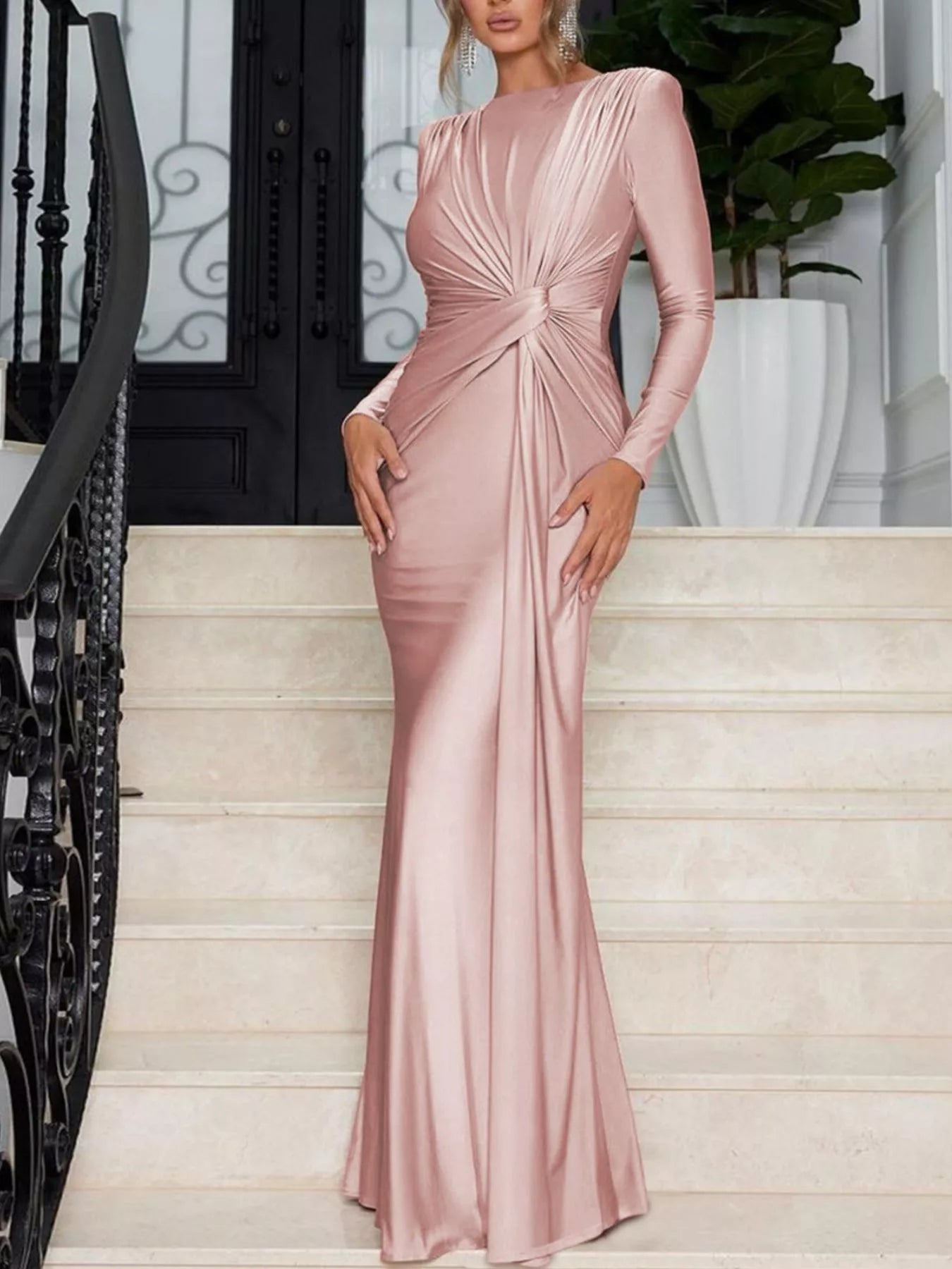 Pink twisted long sleeve maxi dress with gathered knot front, flowing column silhouette