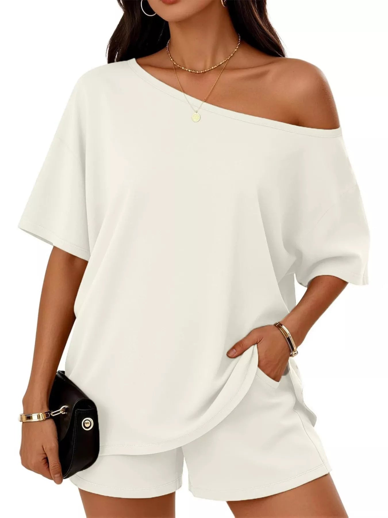 White one-shoulder top and matching shorts set, loose fit, short sleeves