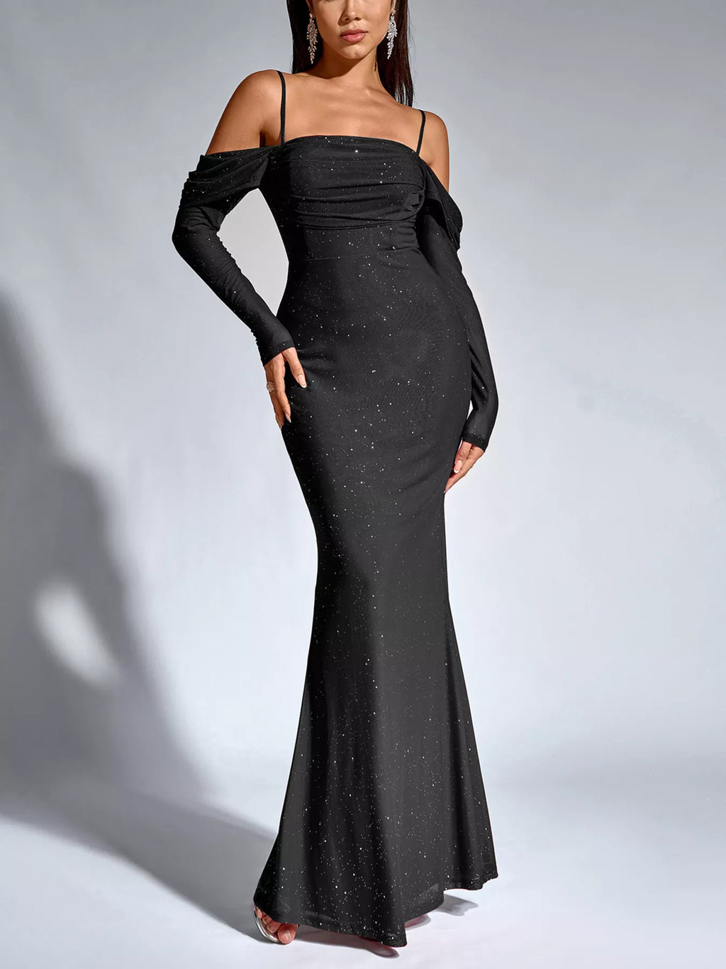 Black glitter off-shoulder mermaid maxi dress with long sleeves and draped neckline