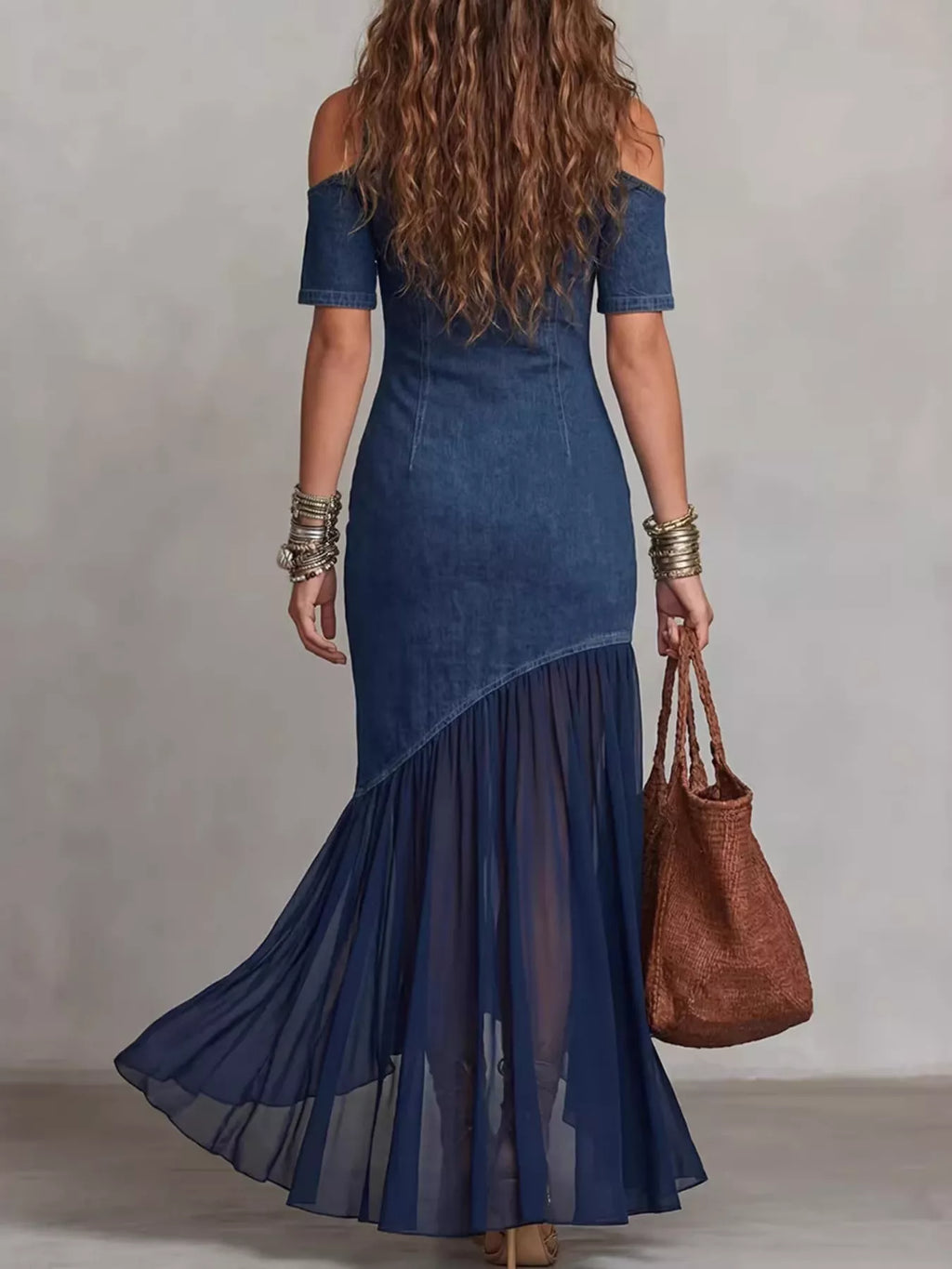 Blue denim cold-shoulder maxi dress with mock neck and asymmetrical ruffle skirt