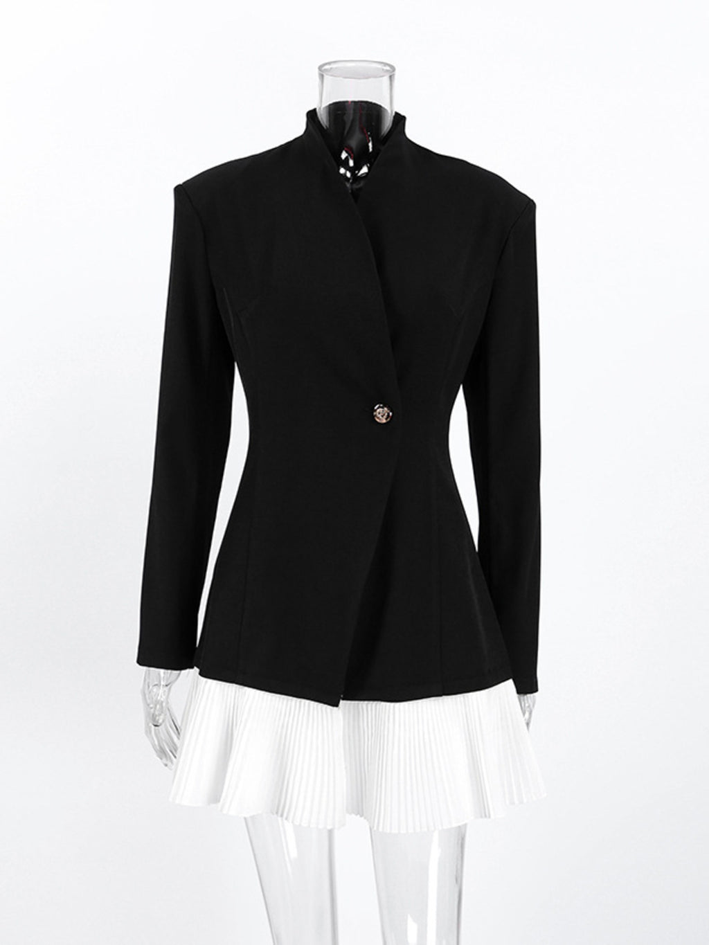 Black one-button blazer dress with long sleeves and pleated white skirt