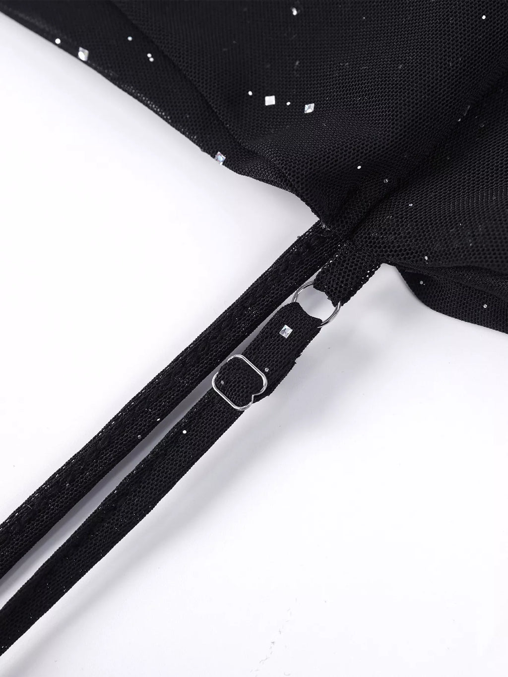 Black corset-style zipper closure on glitter ruched mermaid dress