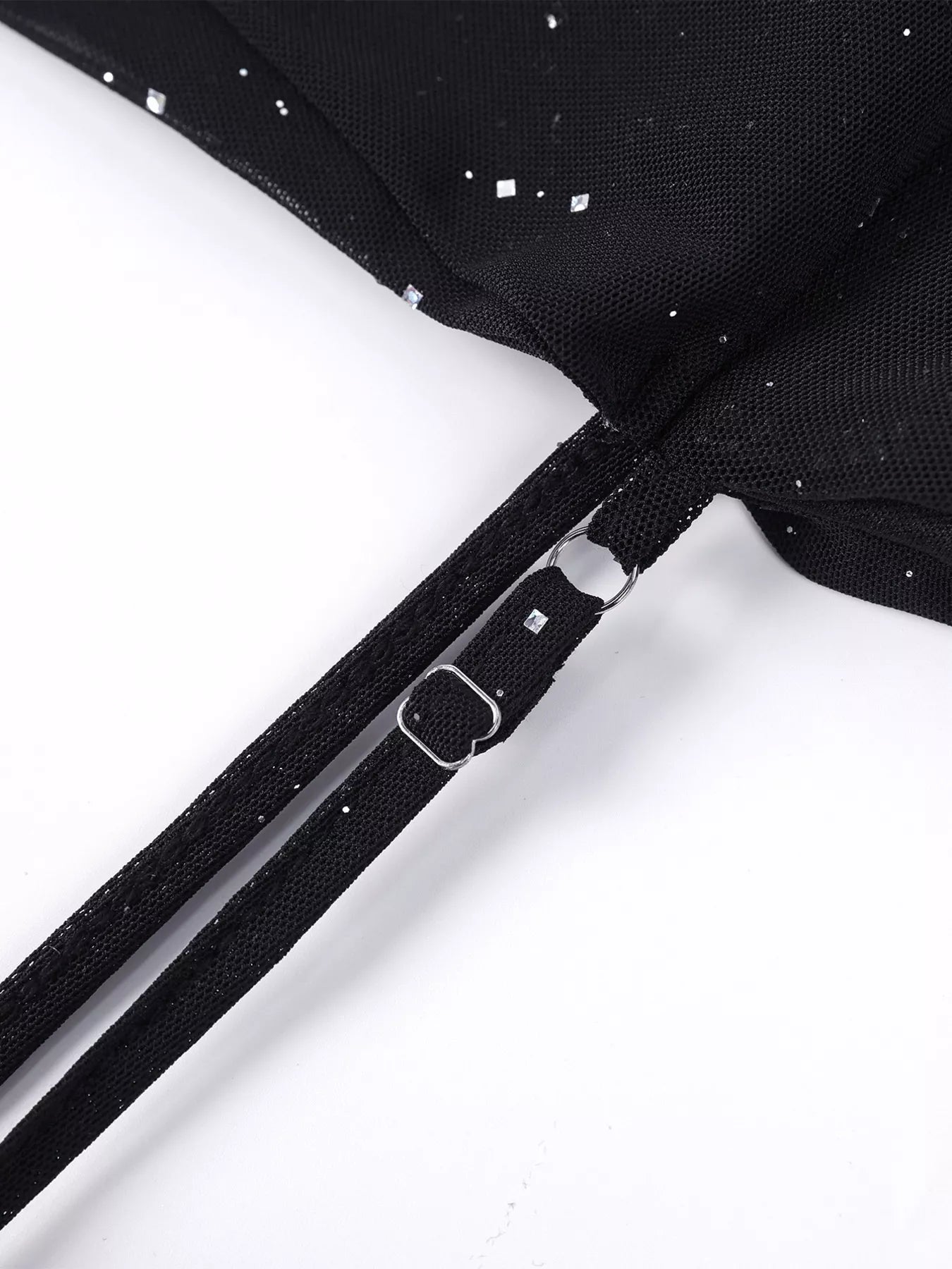 Black corset-style zipper closure on glitter ruched mermaid dress