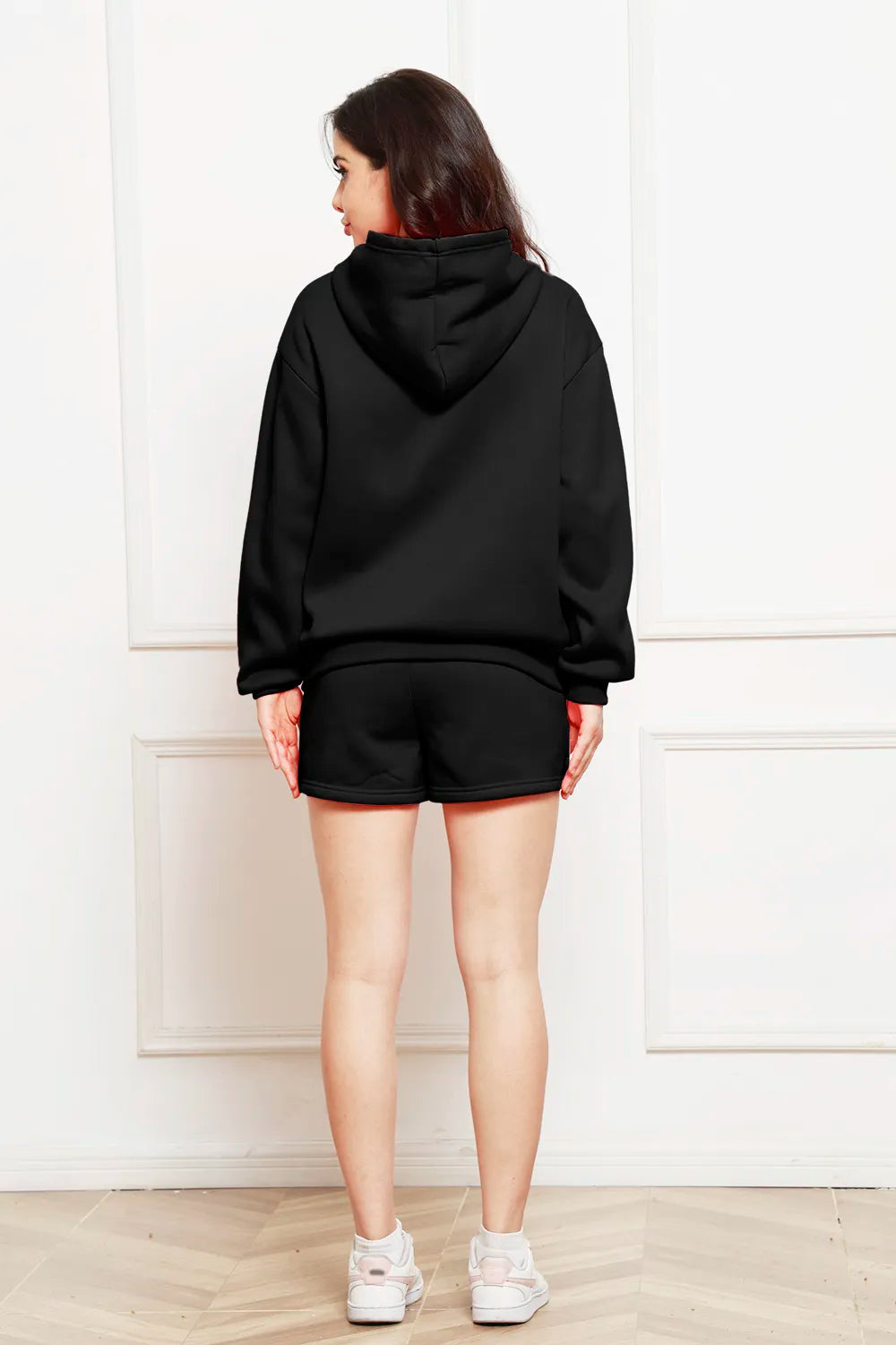 Black hoodie and shorts set, hood up, back view