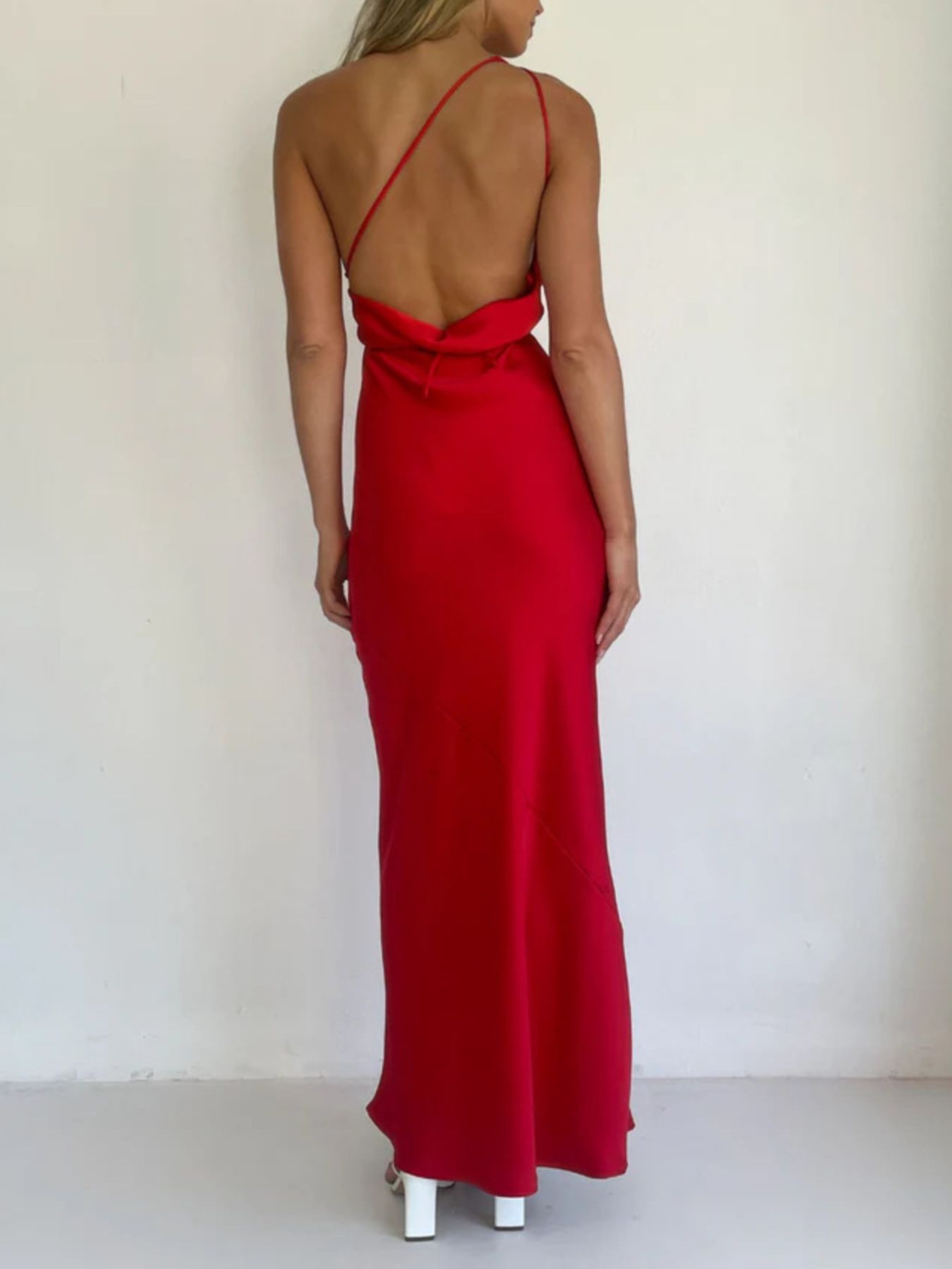 Red satin halter neck maxi dress with open back, cowl neckline and draped straps