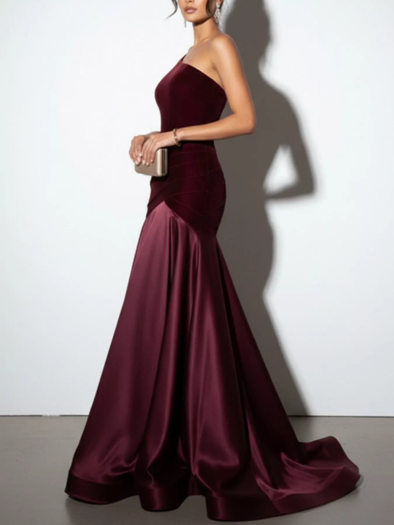 Wine red one-shoulder floor-length dress with draped waist and gathered satin skirt