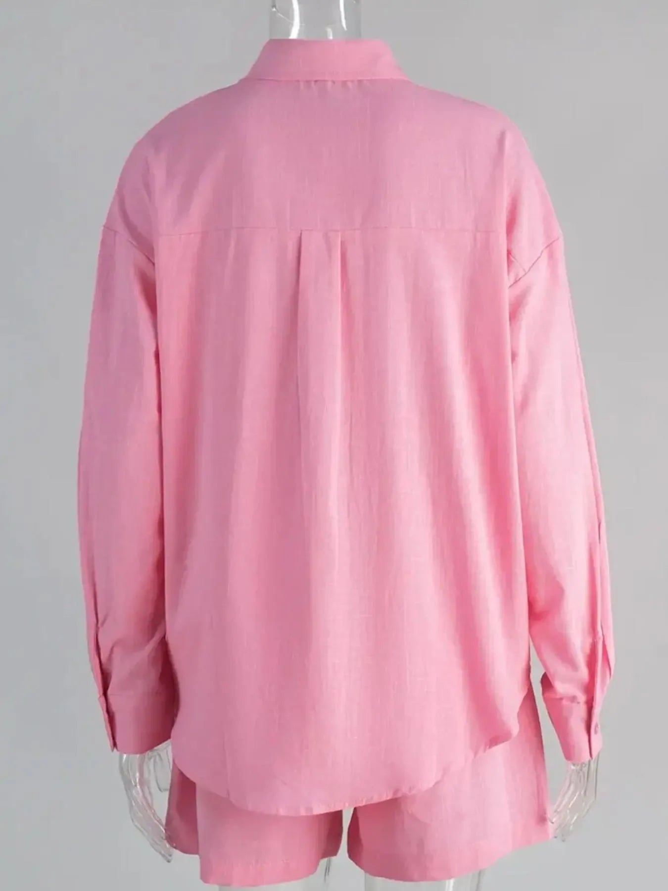 Pink button-up long-sleeve shirt with open back and matching elastic-waist shorts set