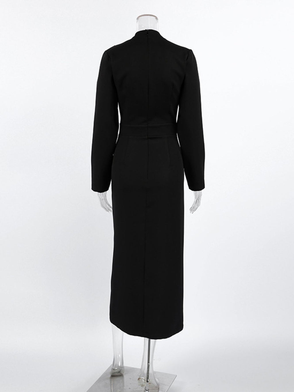 Back view of black long-sleeve midi dress with straight cut and mid-length length.