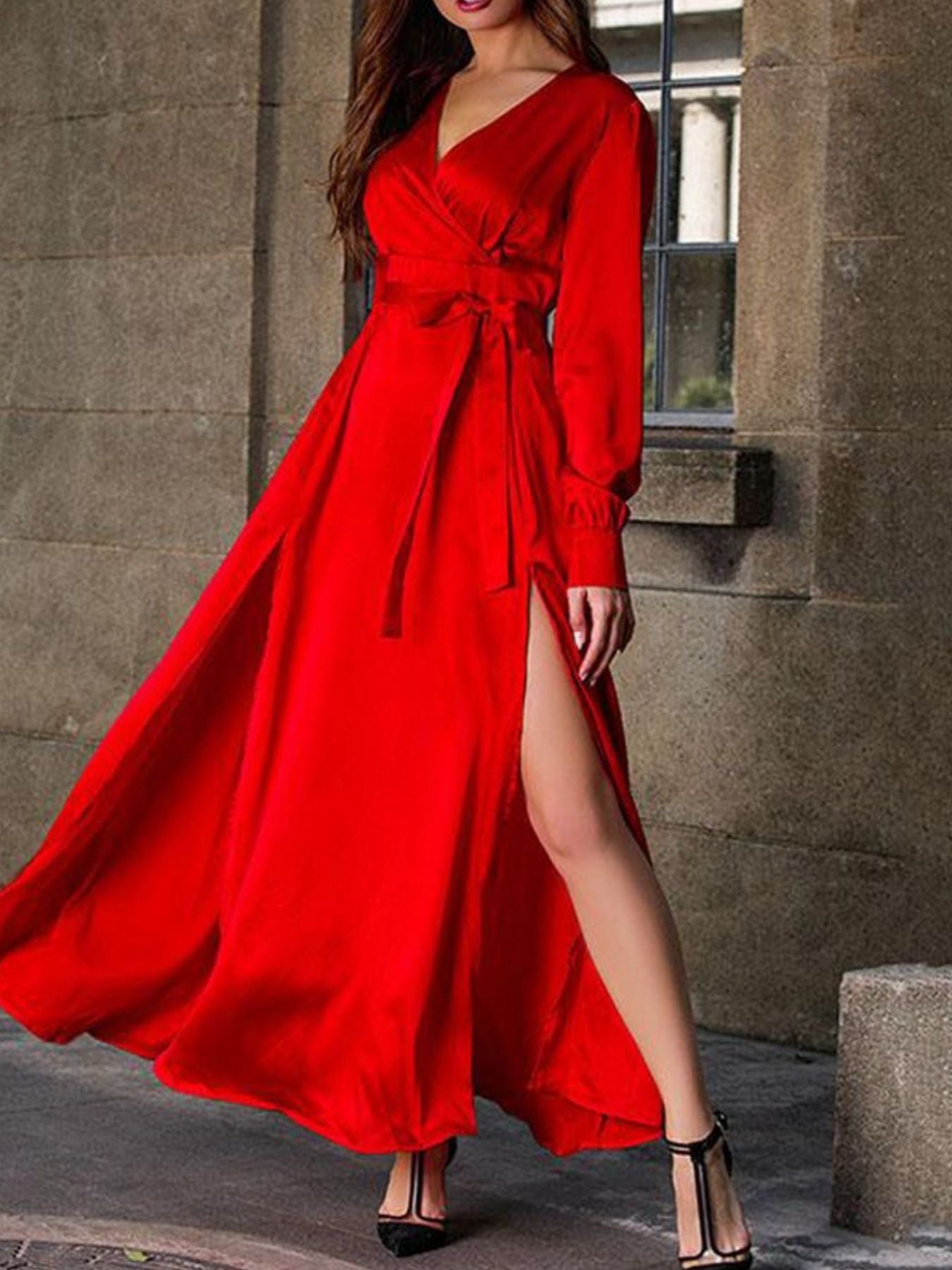 Deep red surplice maxi dress with long sleeves, flared skirt, thigh-high slit