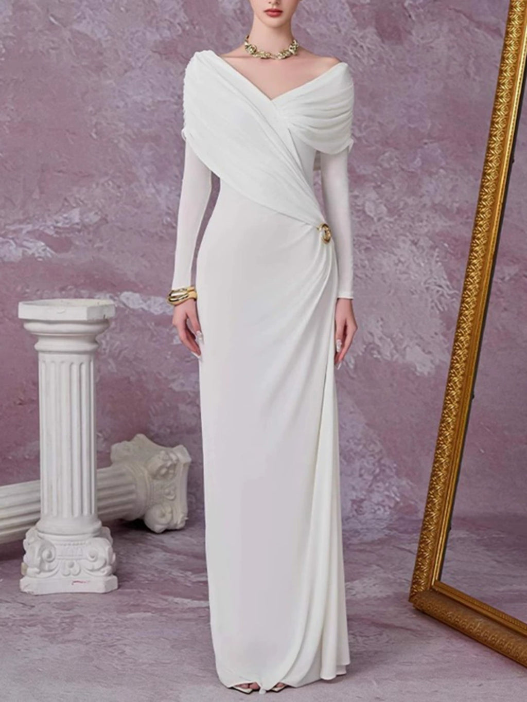 White ruched draped long-sleeve maxi dress with V-neck crossover and shoulder drape.