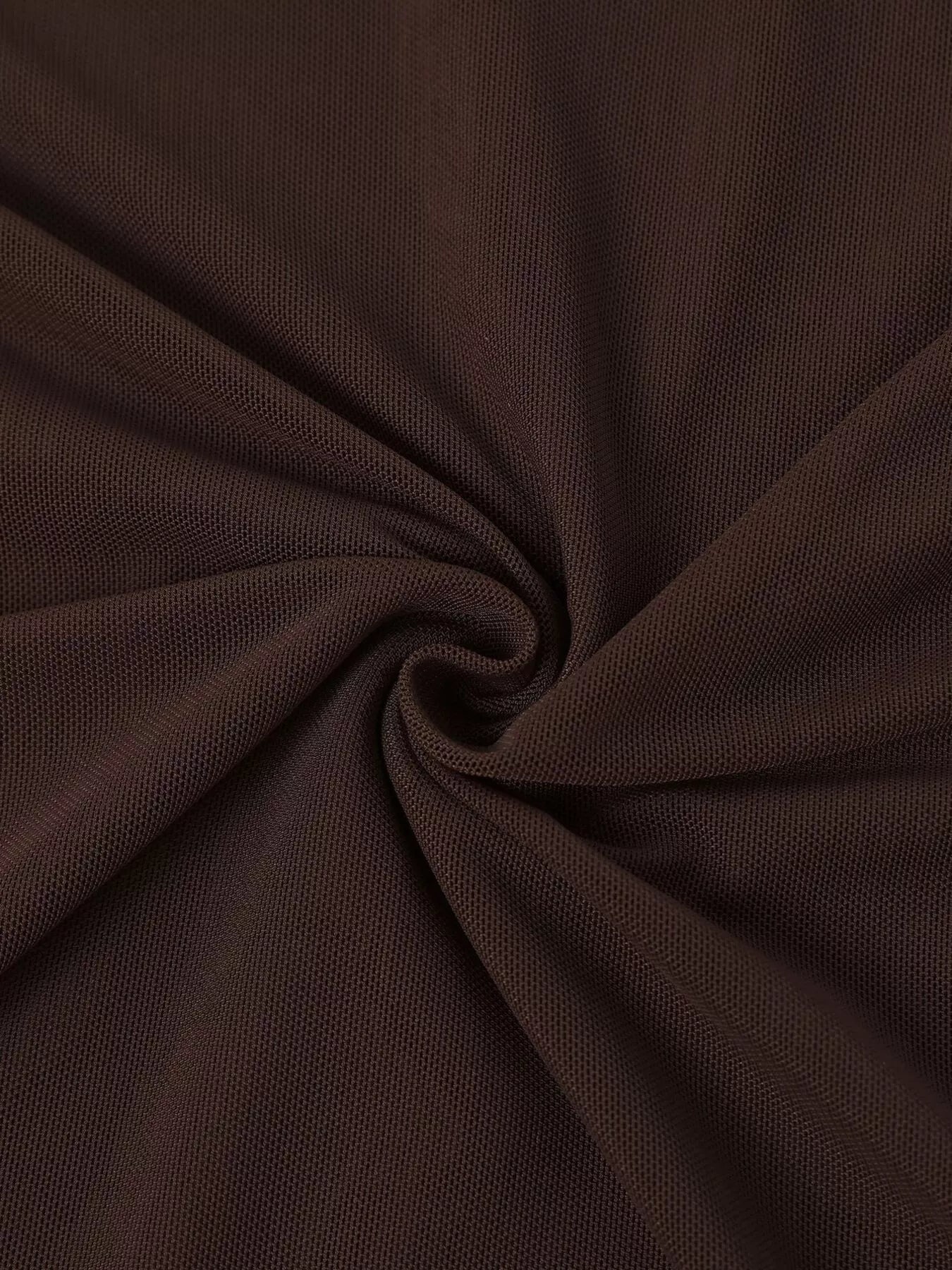 Close-up of brown fabric drape and ruching on an off-shoulder maxi dress