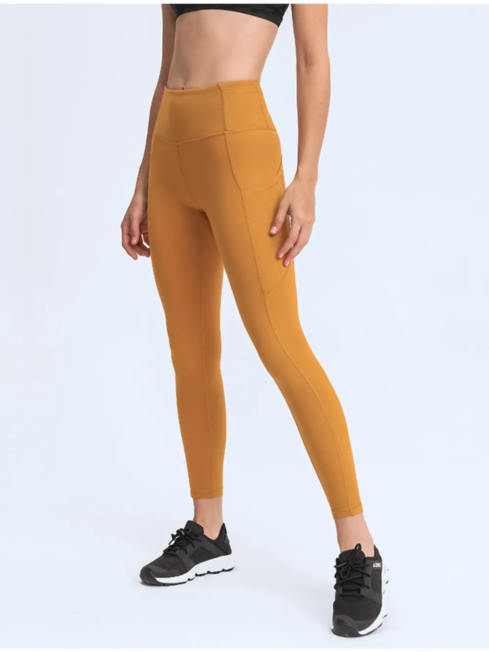 Tangerine leggings with wide waistband and side pockets, full length