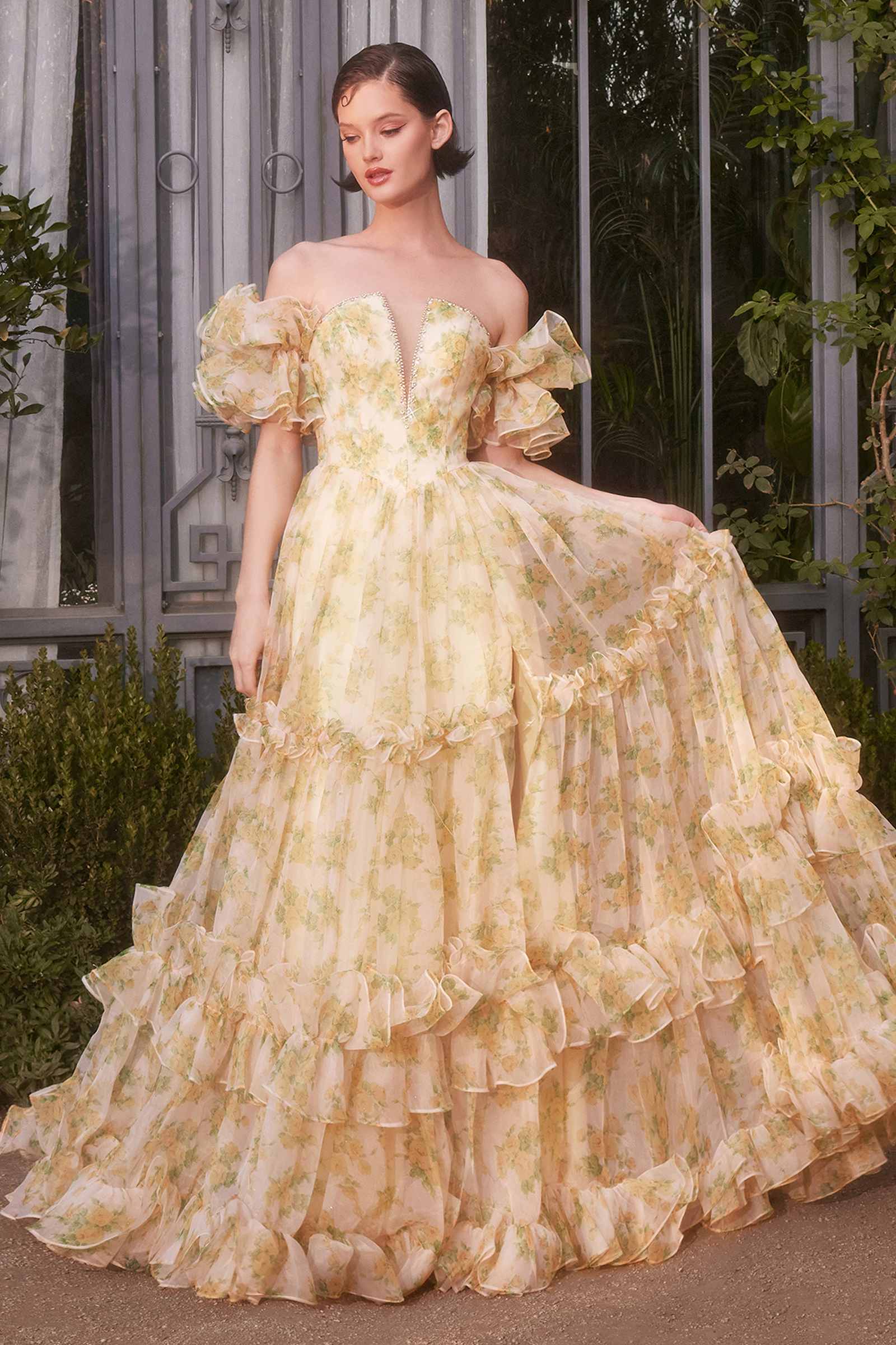 Yellow strapless floral ball gown with puffed off-shoulder sleeves and tiered hem