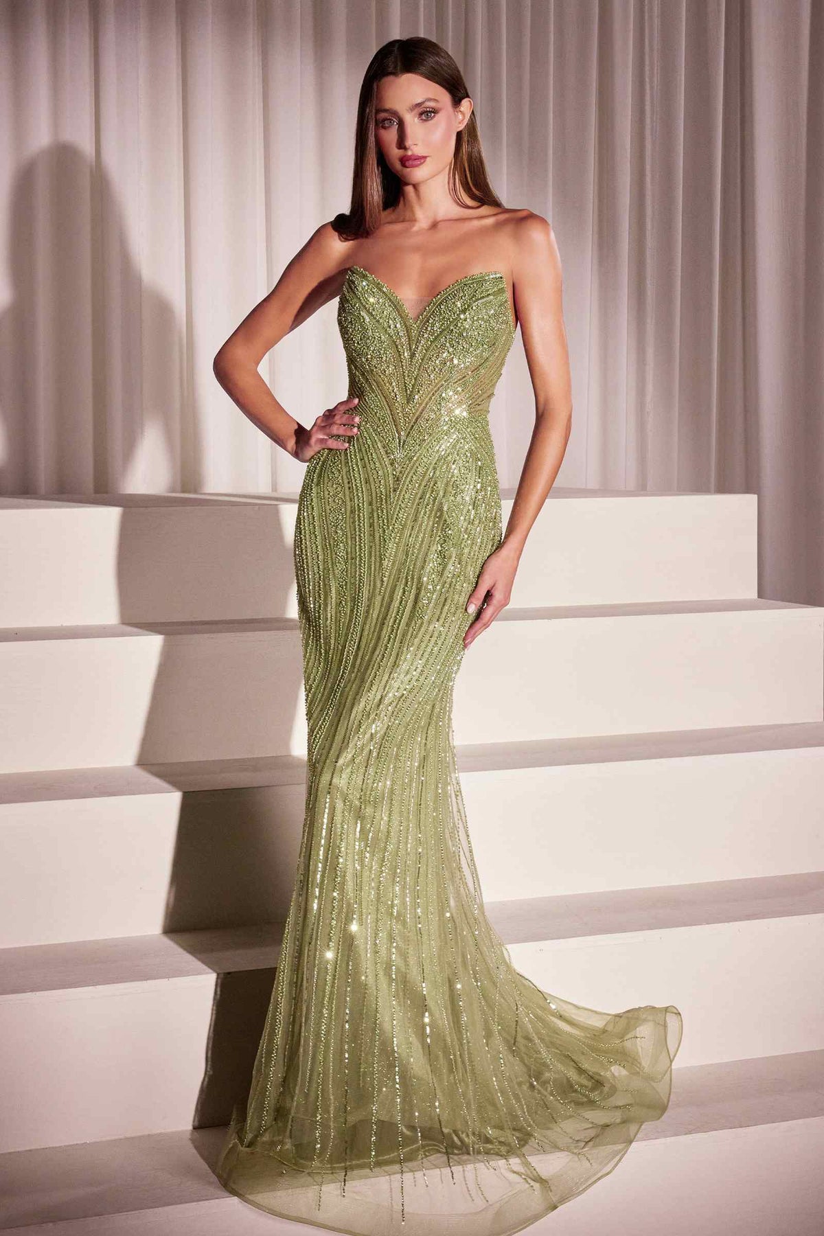 Green sequin strapless fitted gown with sweetheart neckline and long mermaid silhouette