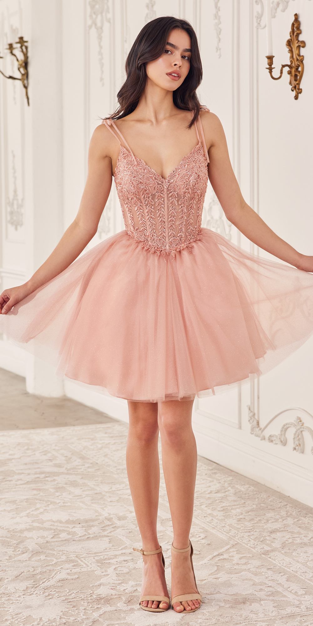 Short A-line tulle homecoming dress in blush pink with corset bodice and thin straps
