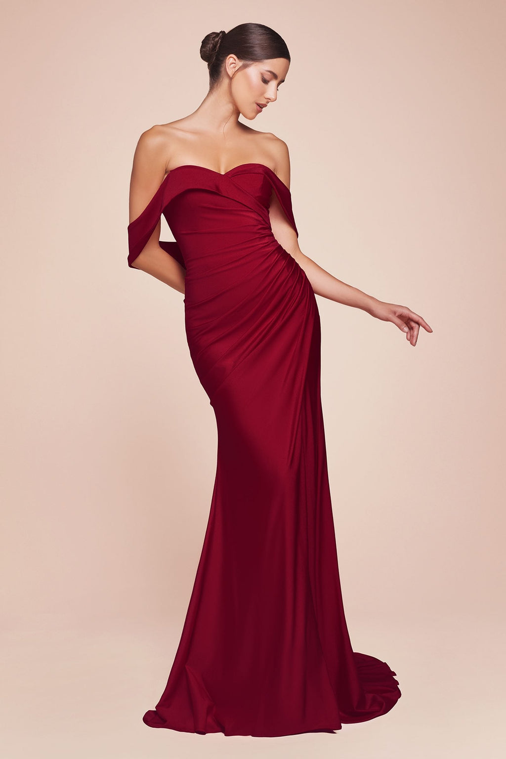 Off-the-shoulder stretch spandex gown in burgundy with ruched bodice and long fluted skirt