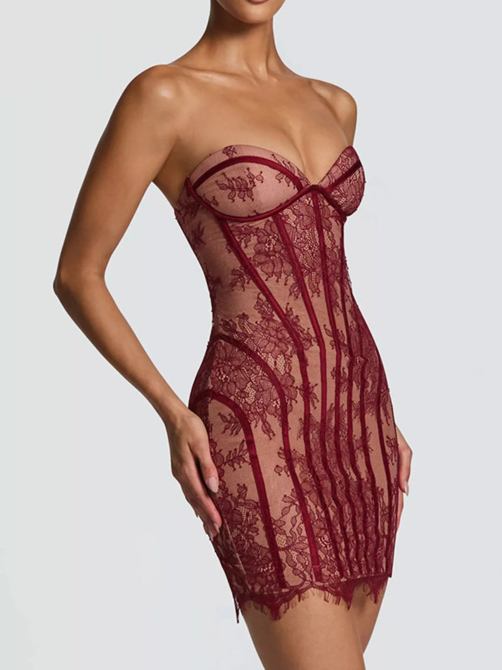Burgundy lace detail tube mini dress, angled front with lace bow at center bust