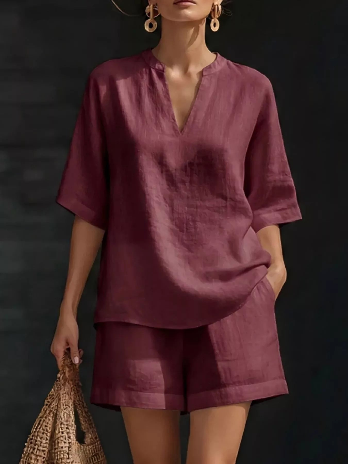 Red half-sleeve V-neck top and matching shorts set with notched neckline