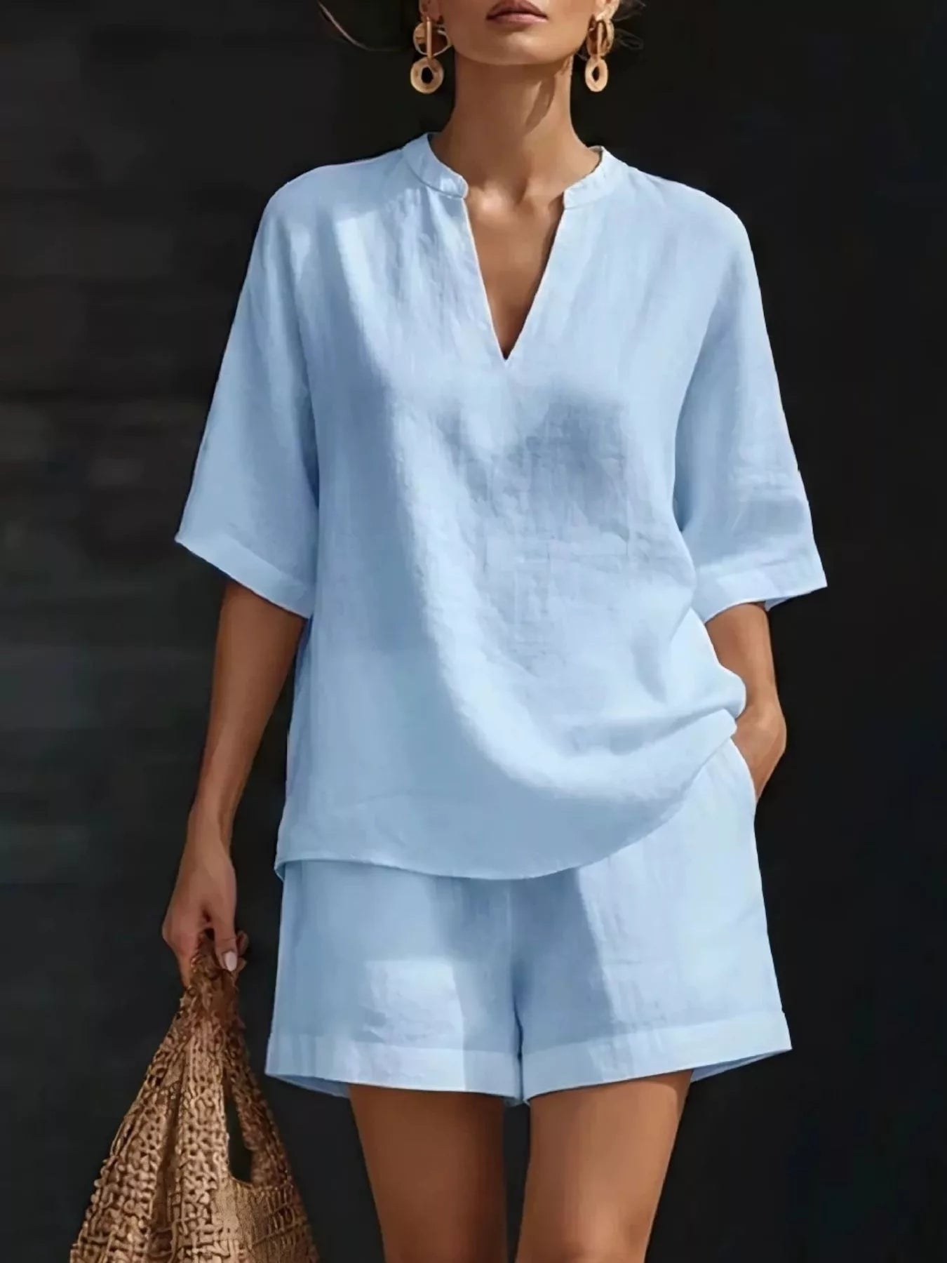 Sky blue half-sleeve V-neck top and matching shorts set with notched neckline