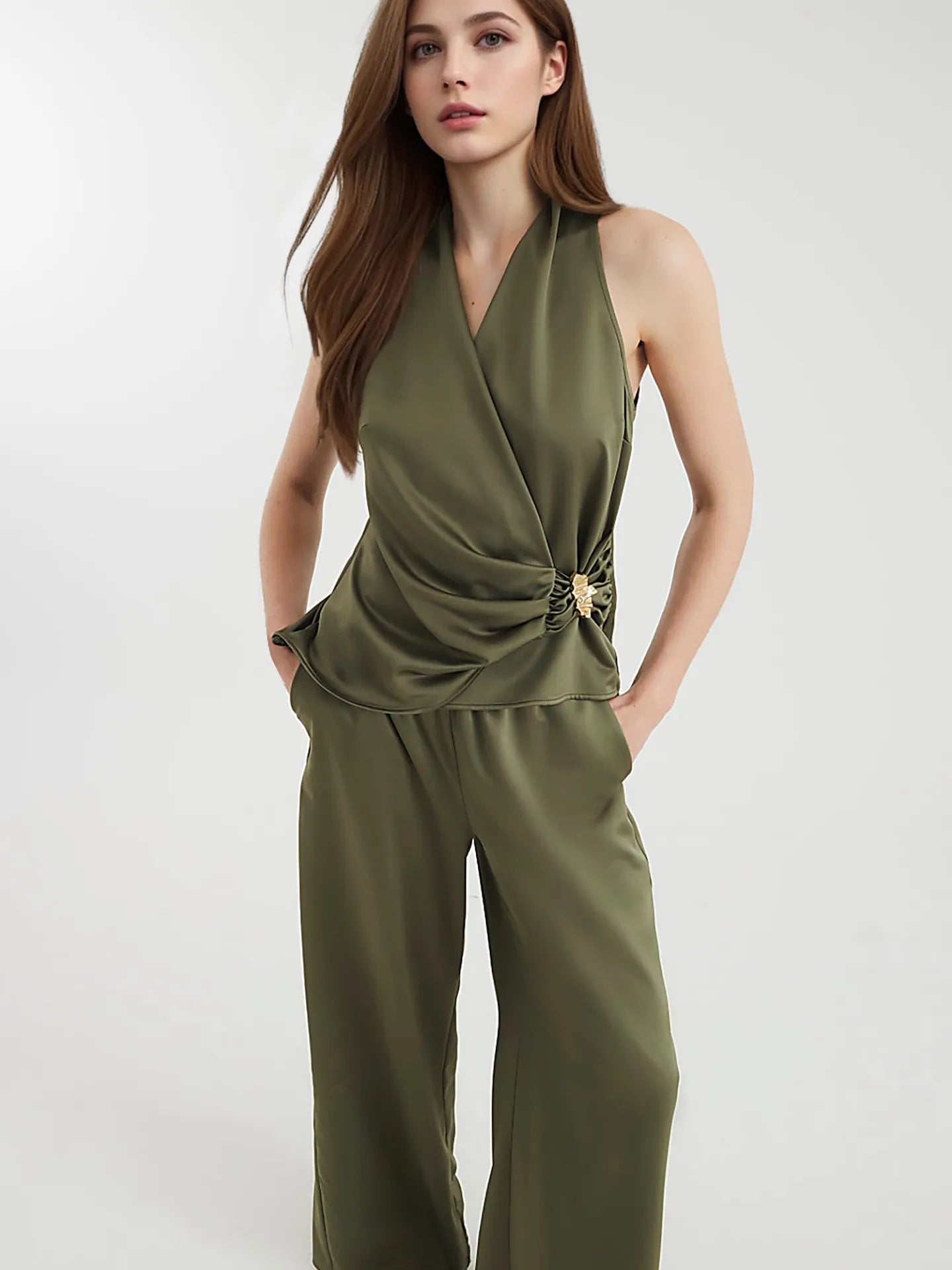 Olive green surplice sleeveless top with ruched waist and wide-leg pants, front
