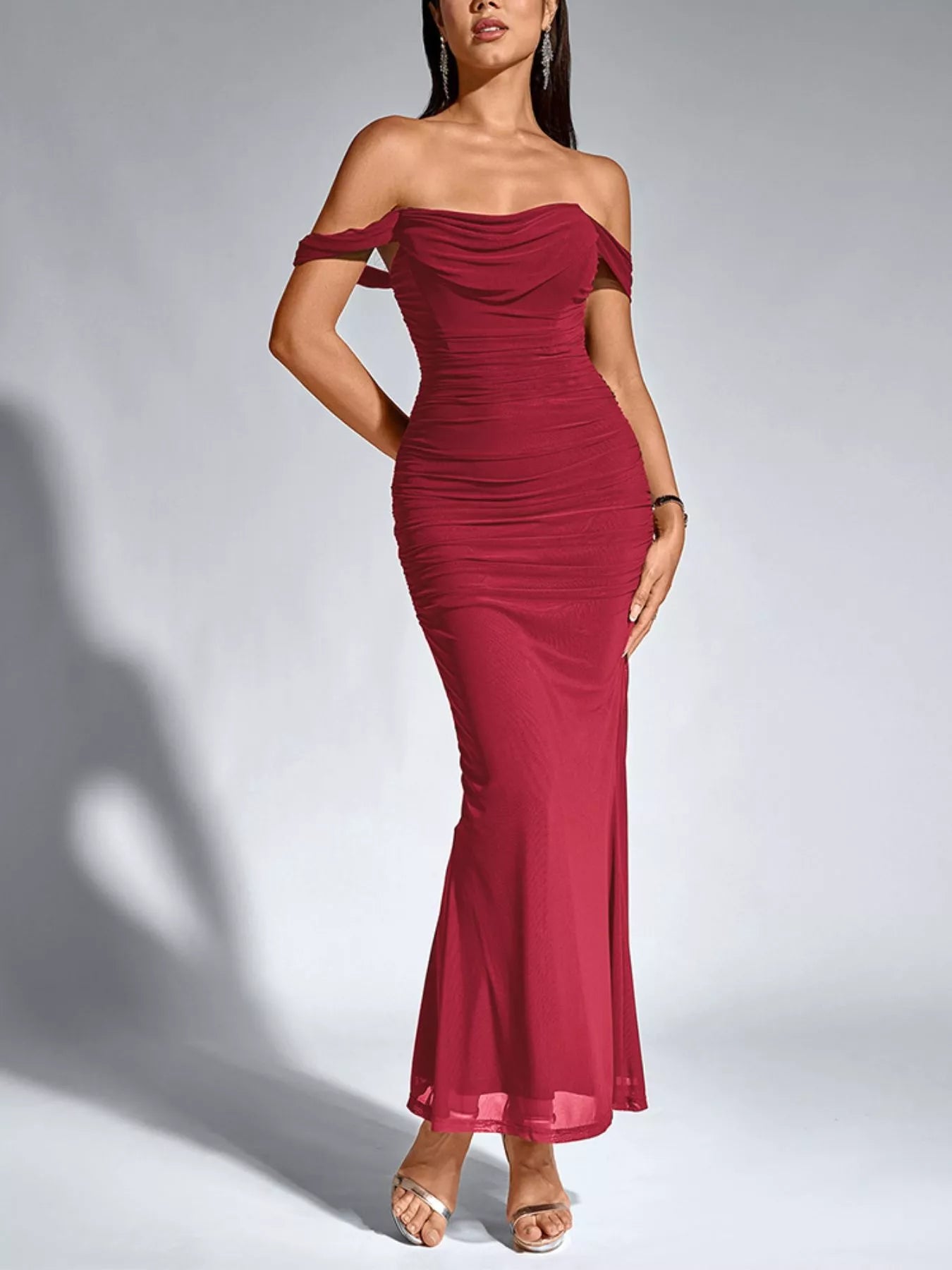 Burgundy off-shoulder ruched mermaid maxi dress with fitted, draped bodice
