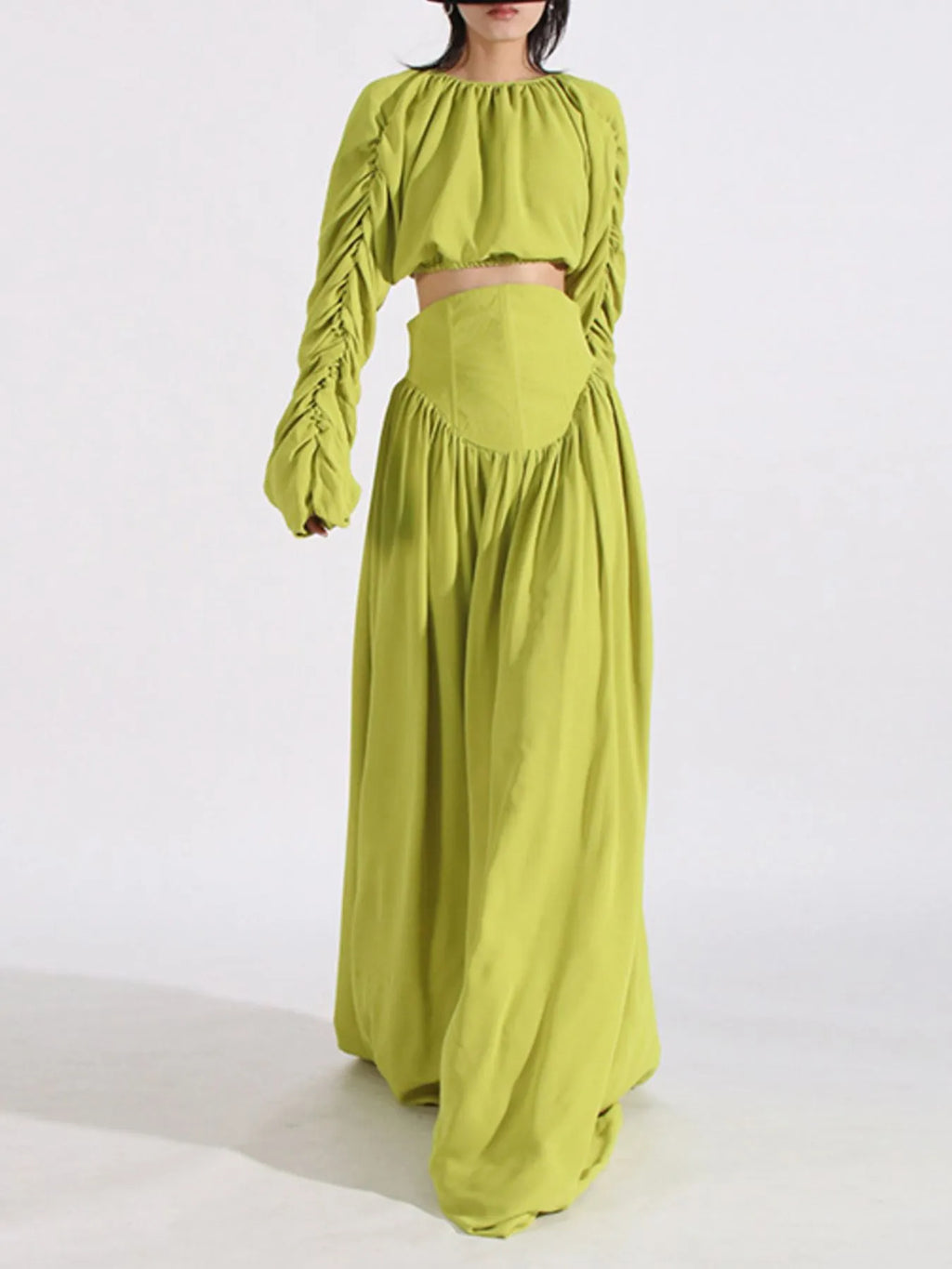 Green ruched long-sleeve crop top and high-waist maxi skirt set