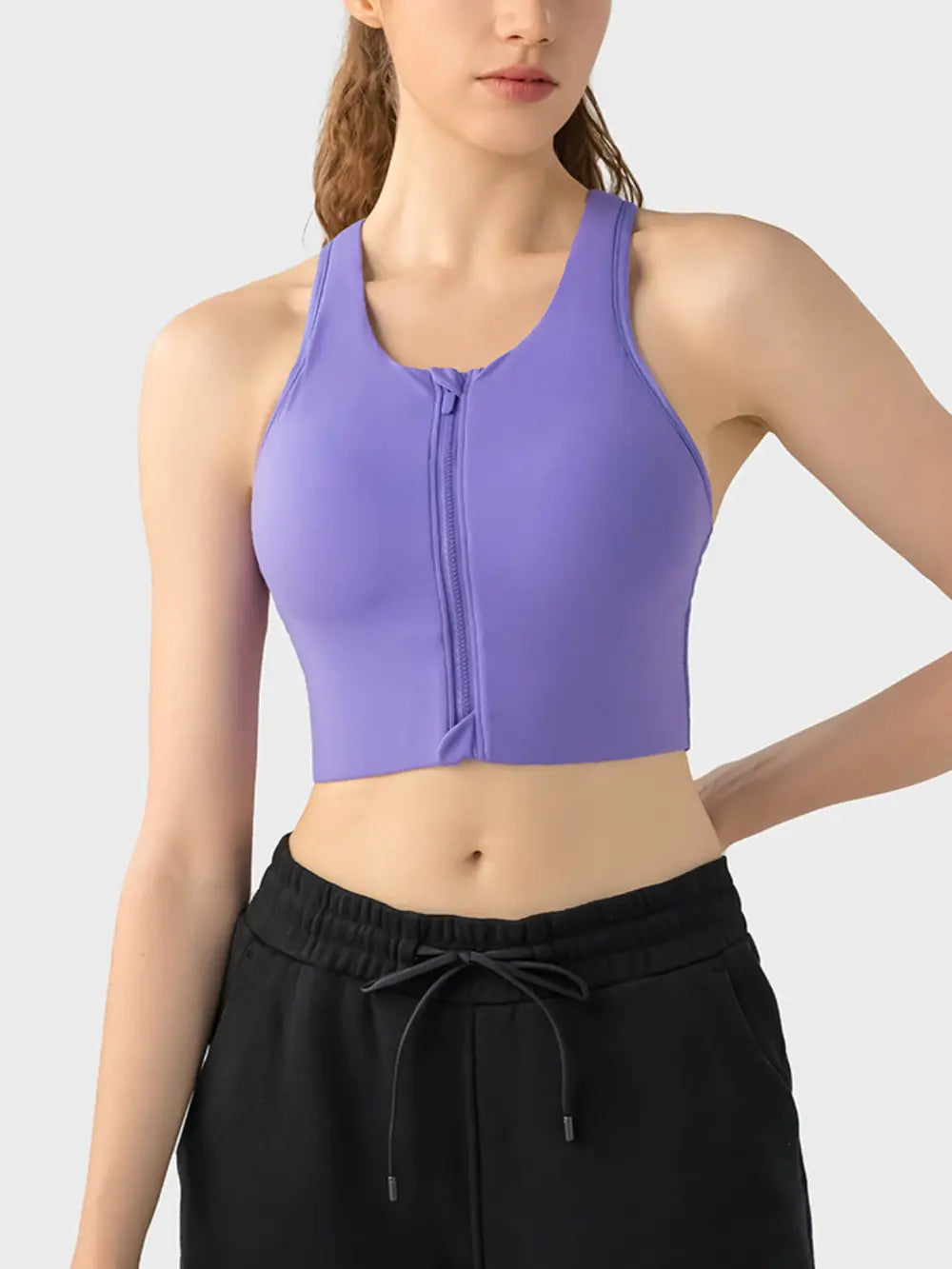 Purple wide-strap sport bra with front zipper and racerback neckline