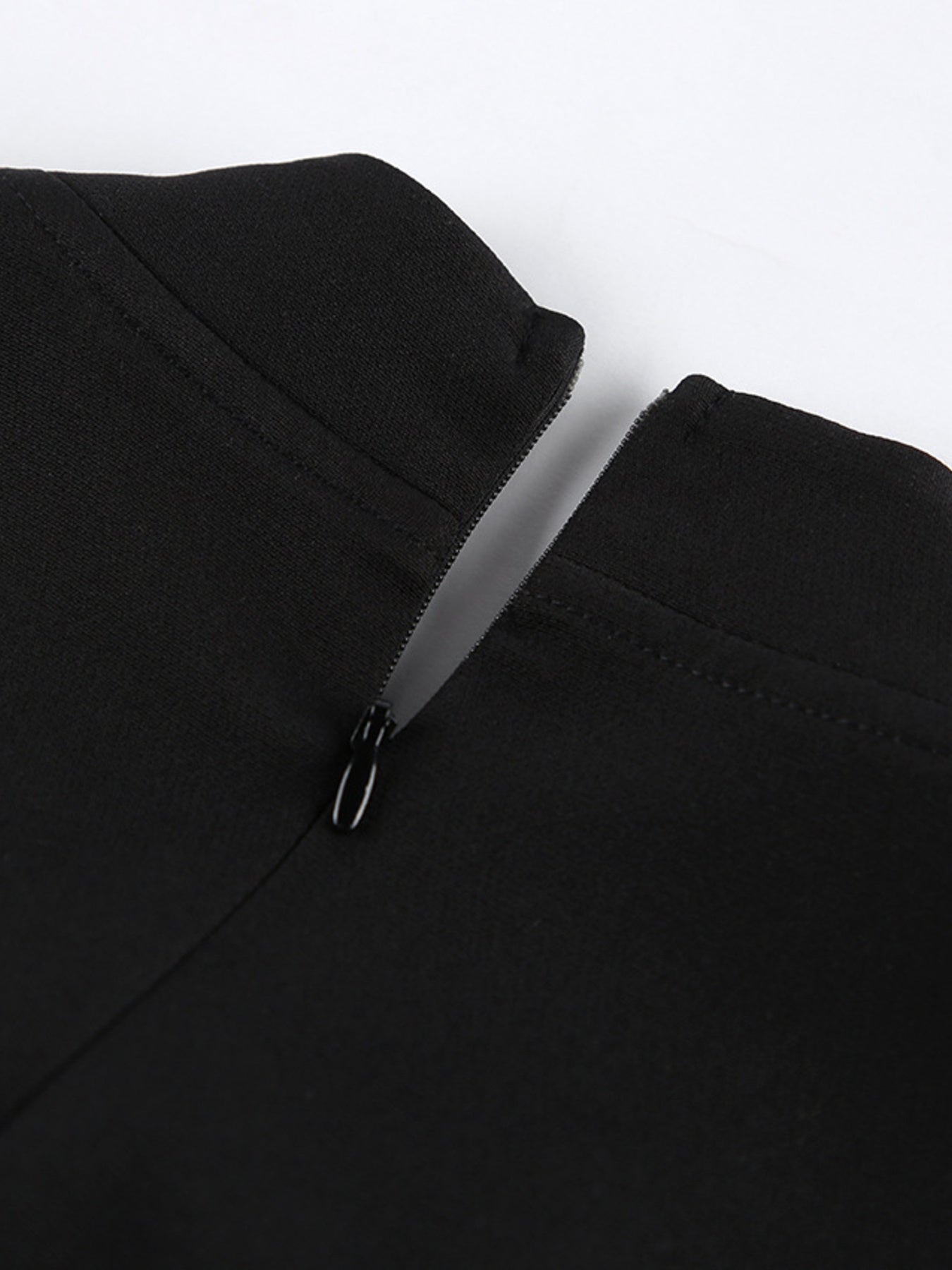 Black ruched long-sleeve midi dress, neck zip and gathered cuff