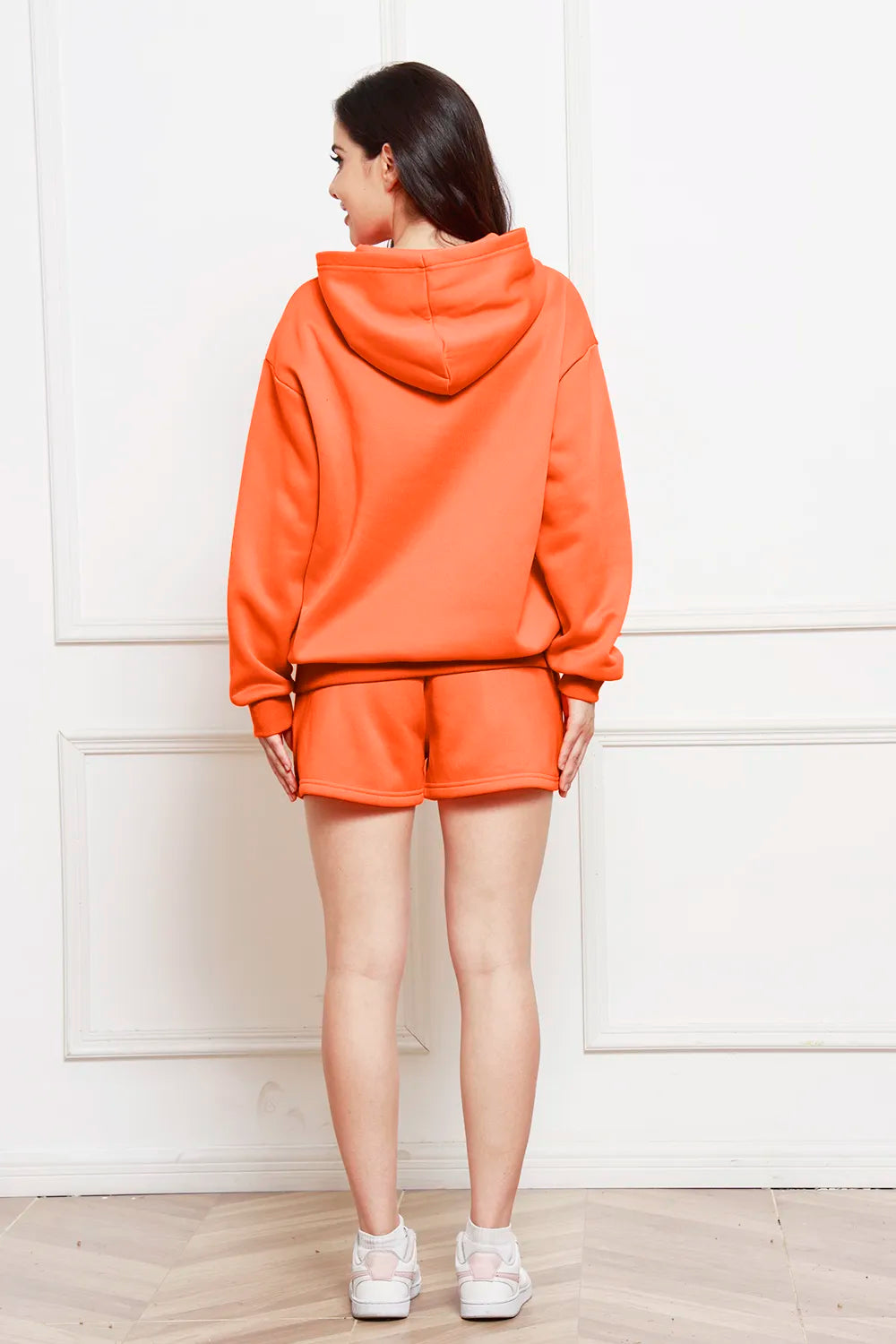 Caramel orange drop-shoulder hoodie and matching shorts set, back view
